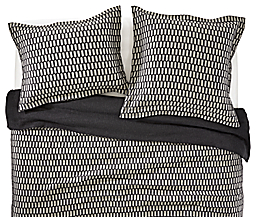 Detail of the Sheffield Duvet and Shams in black with White Signature Percale Sheets.