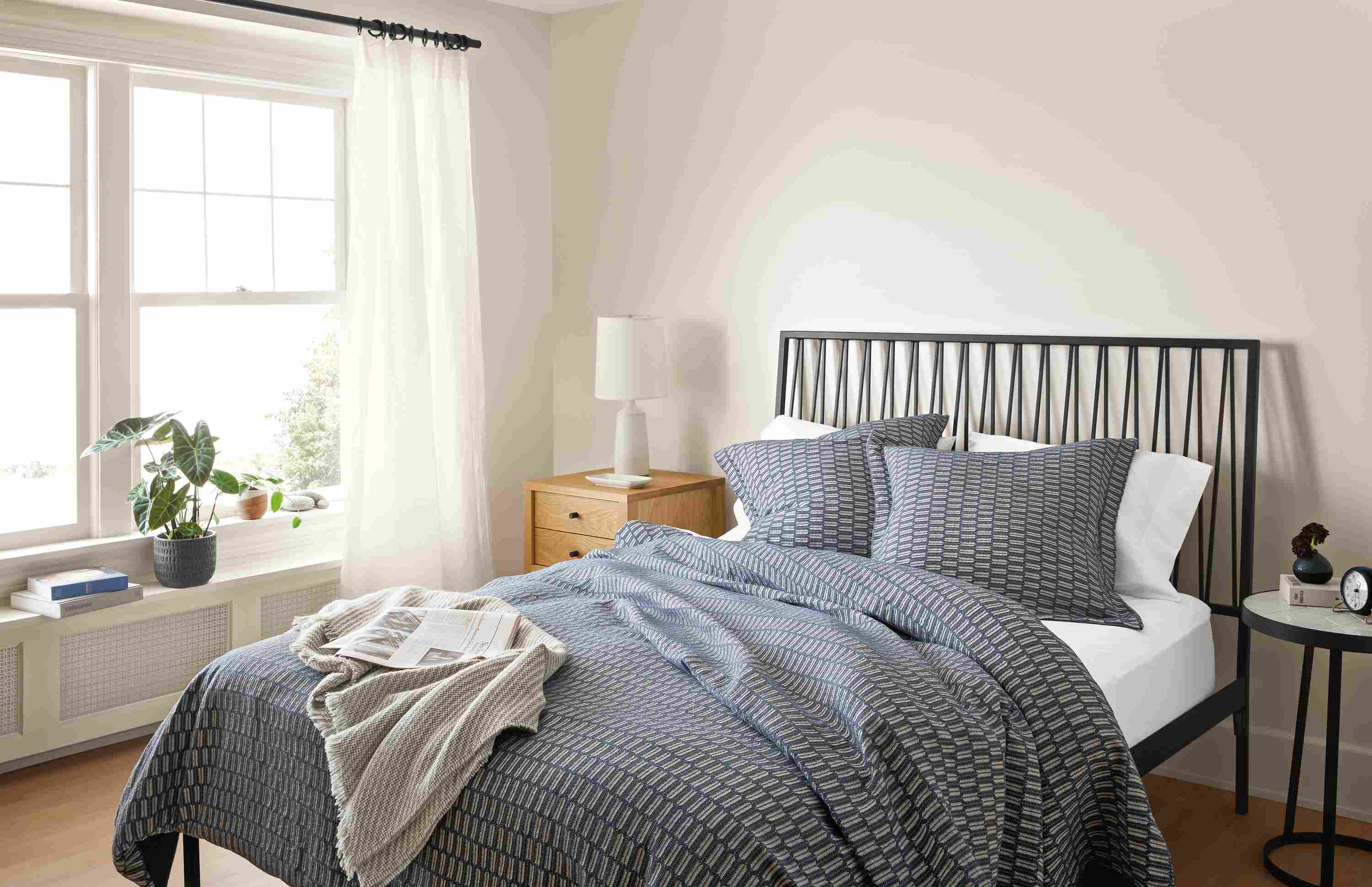 Bedding image with Sheffield duvet in marine on Jennings queen bed.