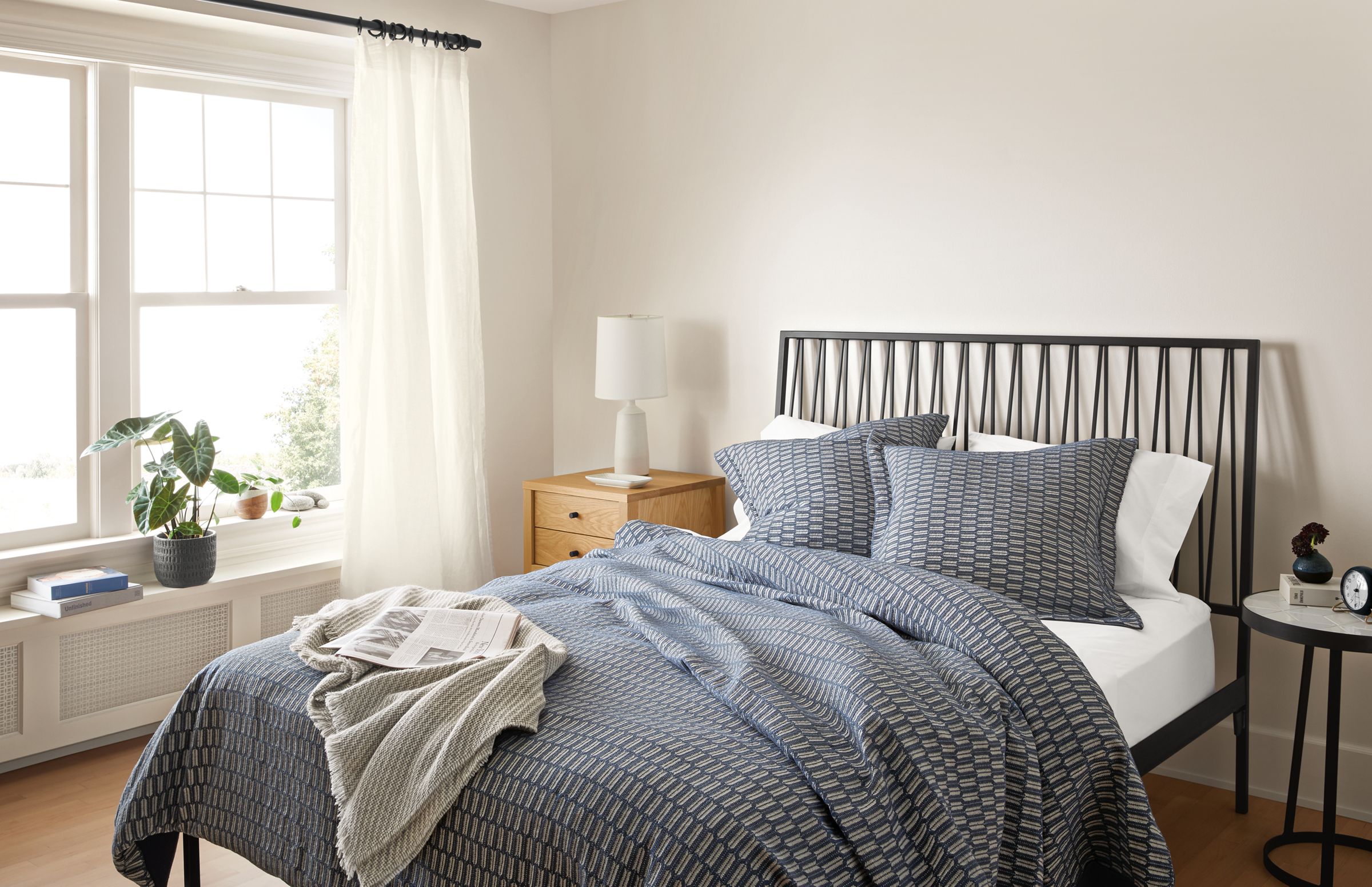 Bedding image with Sheffield duvet in marine on Jennings queen bed.