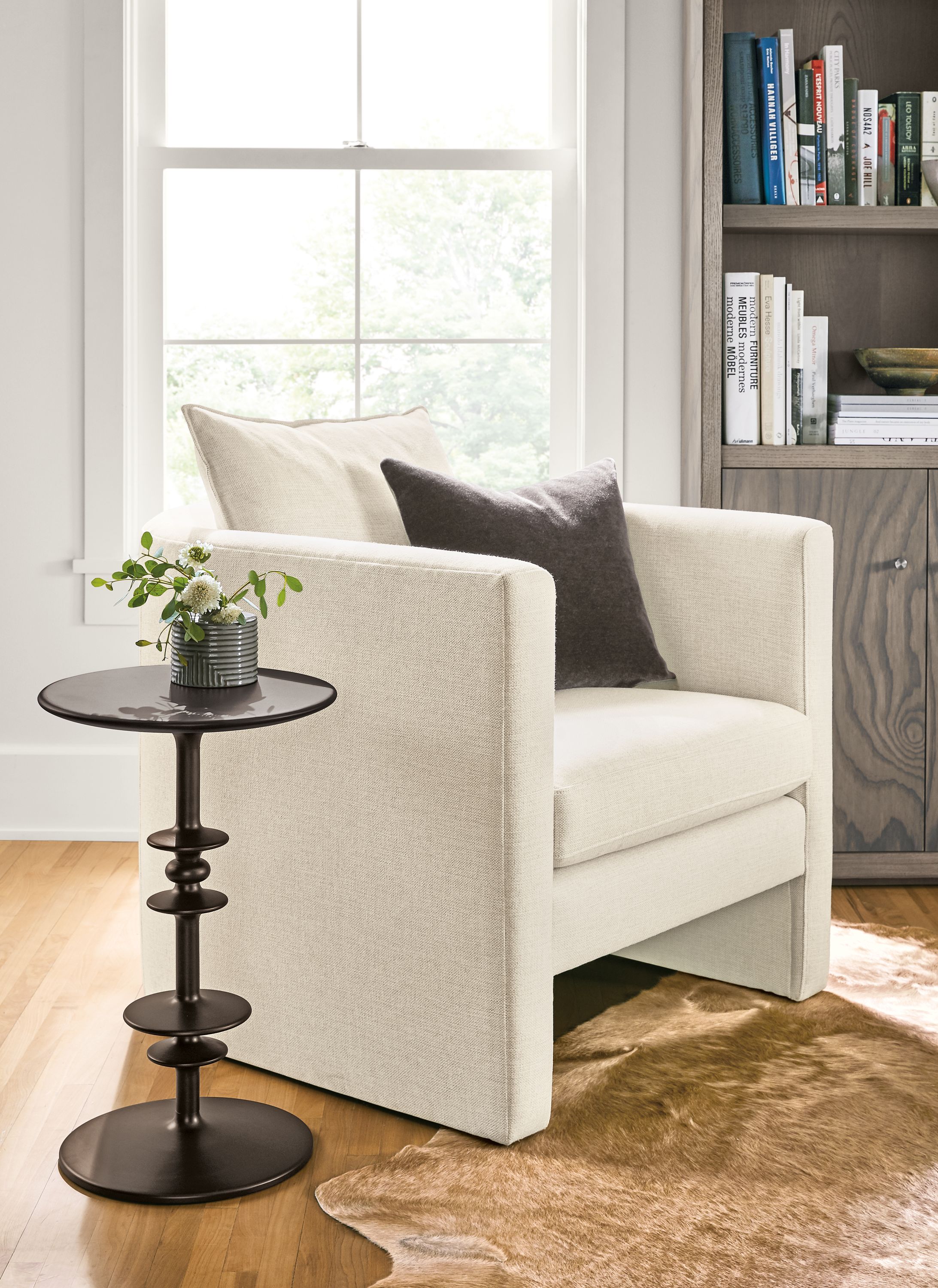 Detail of Silva chair in sumner ivory fabric in living room.