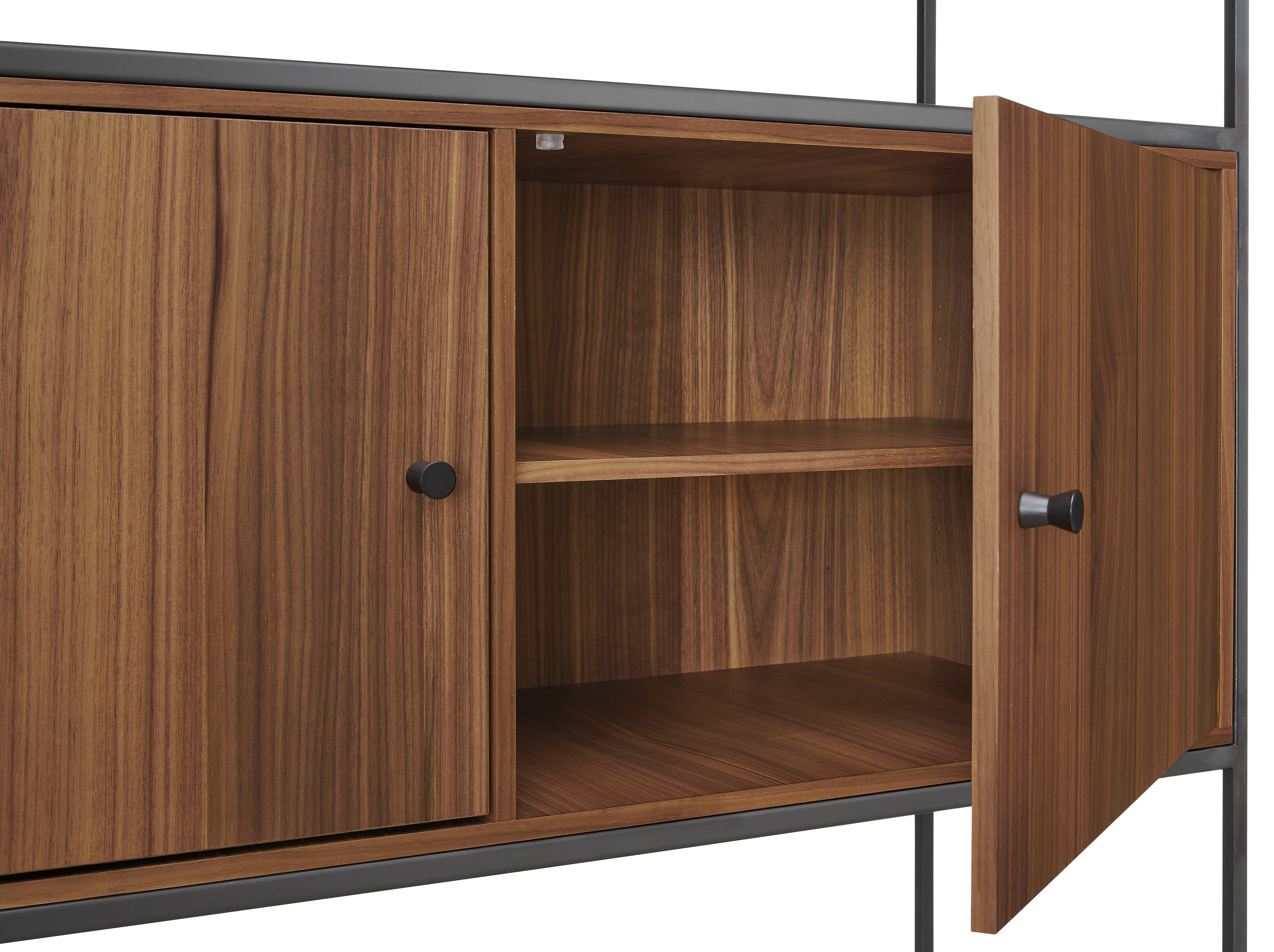 Detail of slim two-door open insert bookcase with right door open to show shelf.