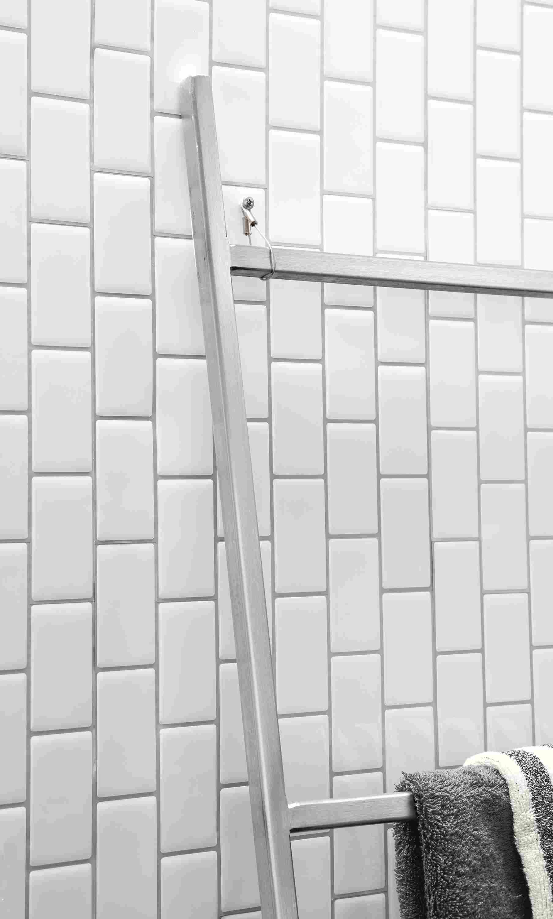 Detail of anti-tip safety hardware for Slim ladder.