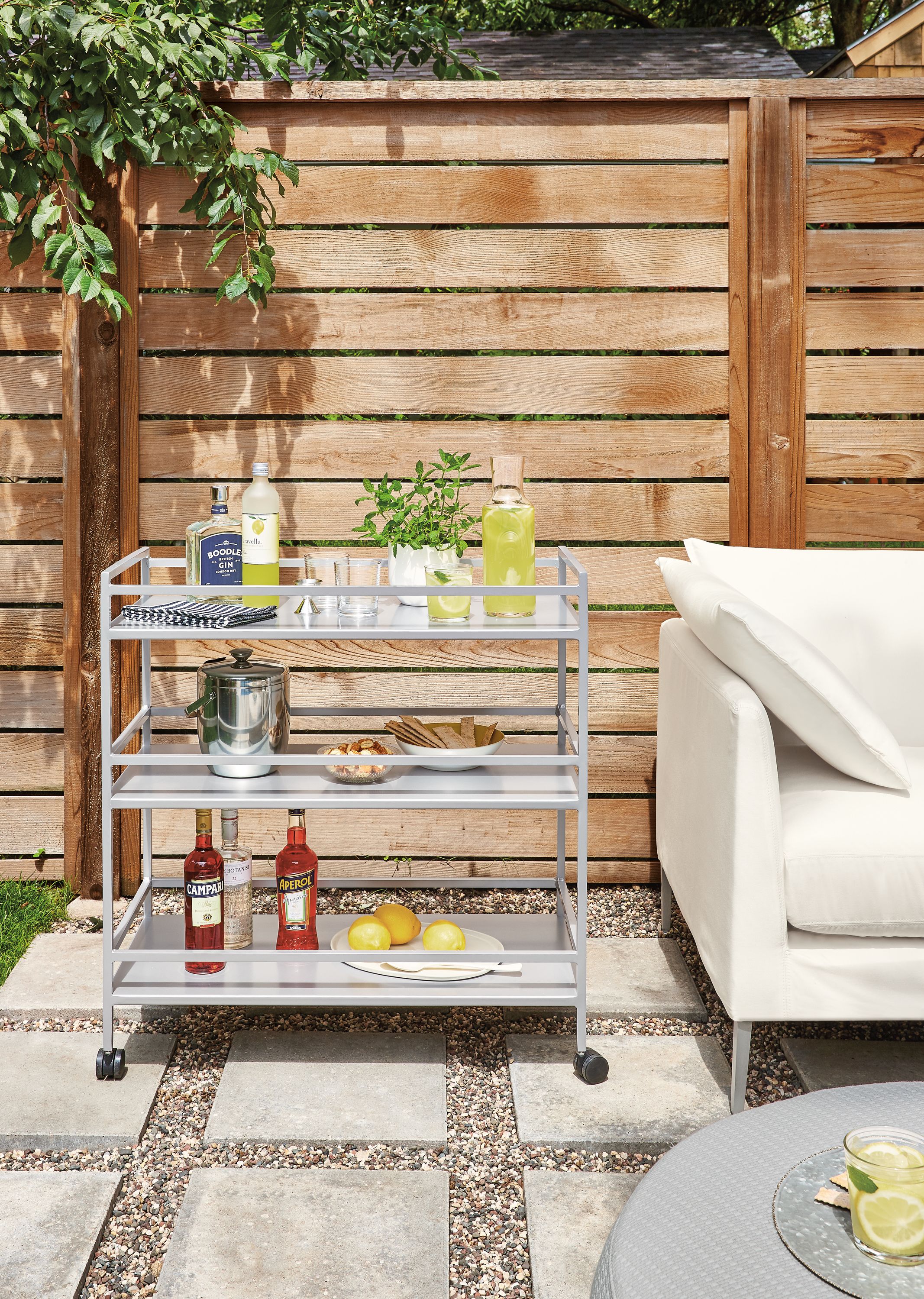 Detail of Slim outdoor bar cart in silver.