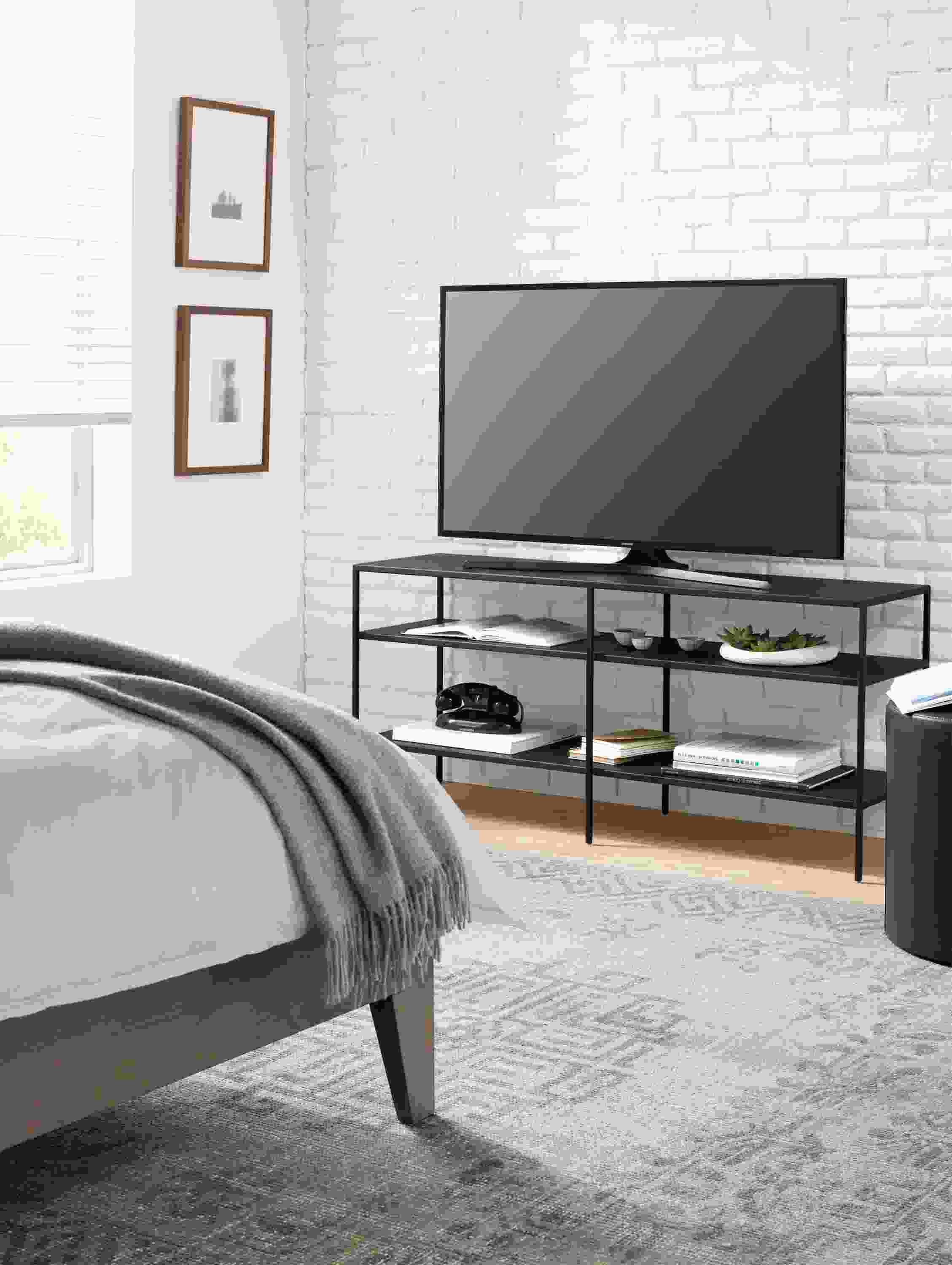 Detail of Slim media console in natural steel.