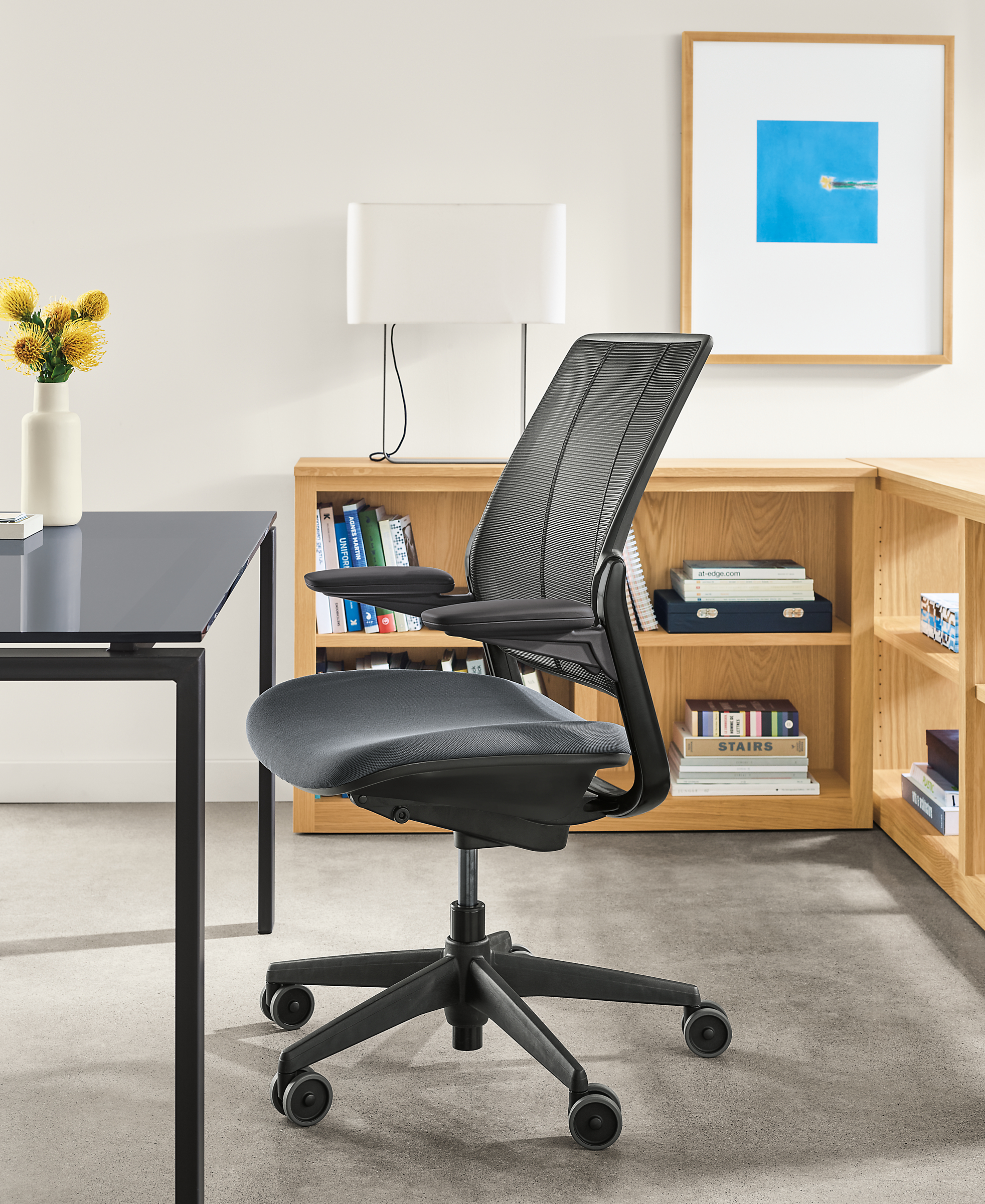 Detail of Diffrient smart ocean office chair in graphite finish in office.