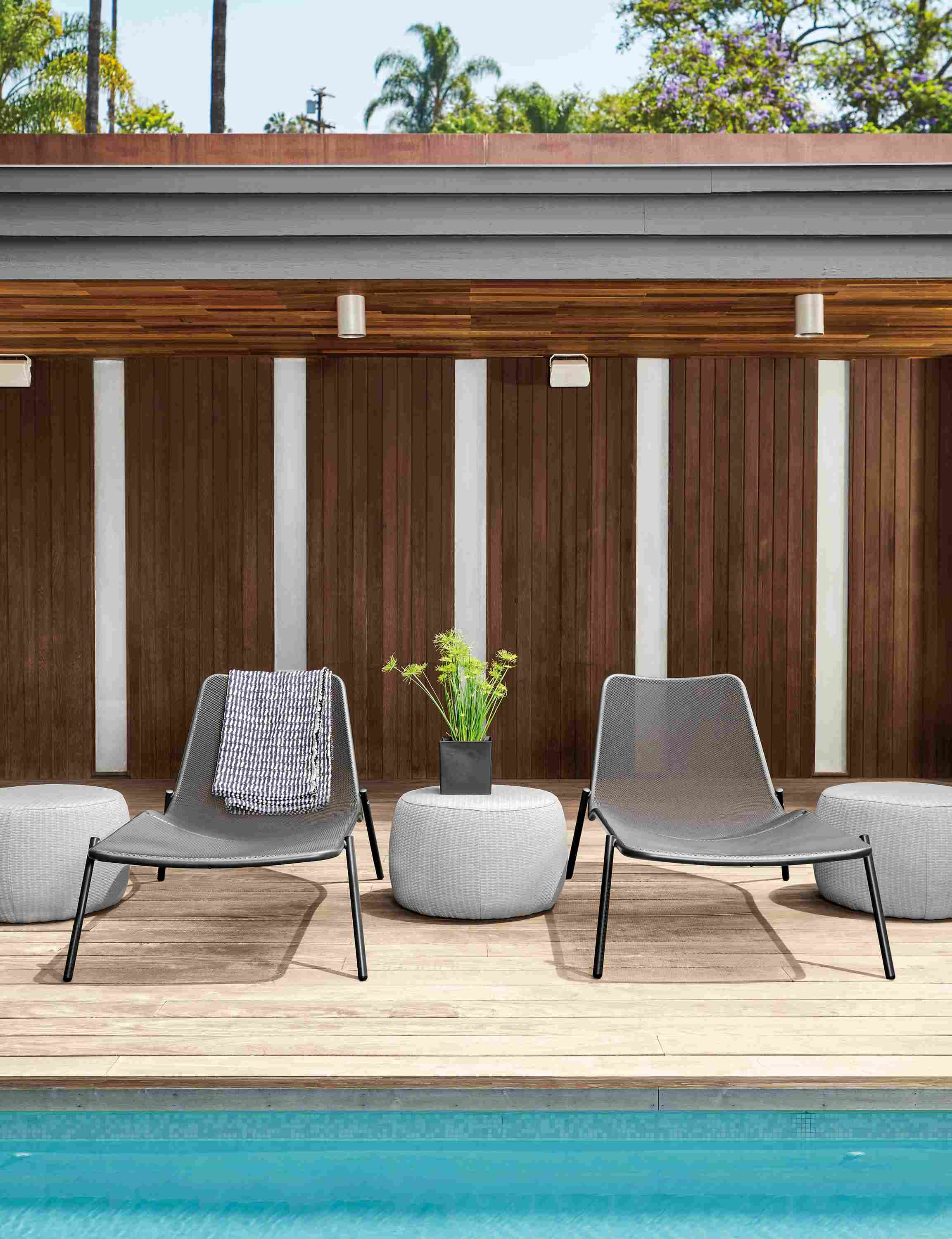 Detail of Soleil outdoor chairs by pool.