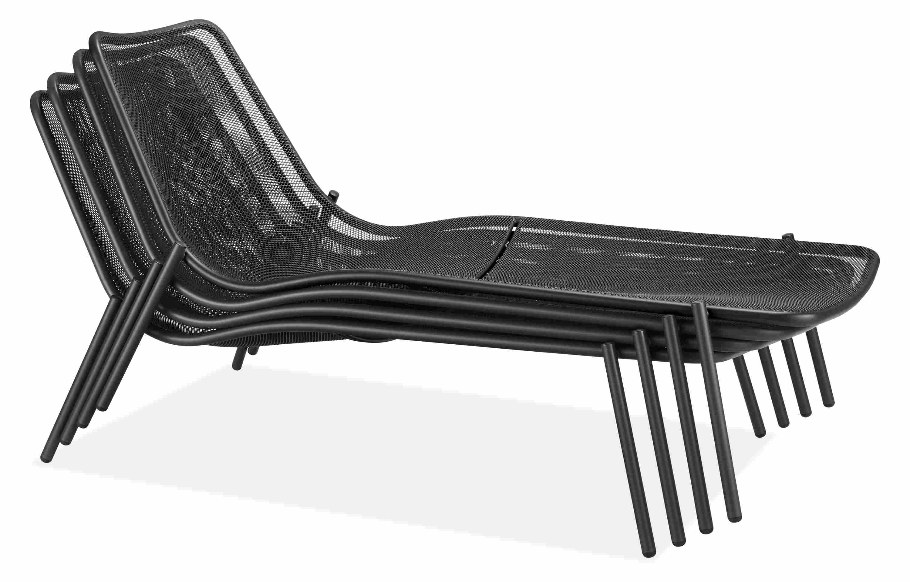 Silhouette detail of stacked Soleil chairs.