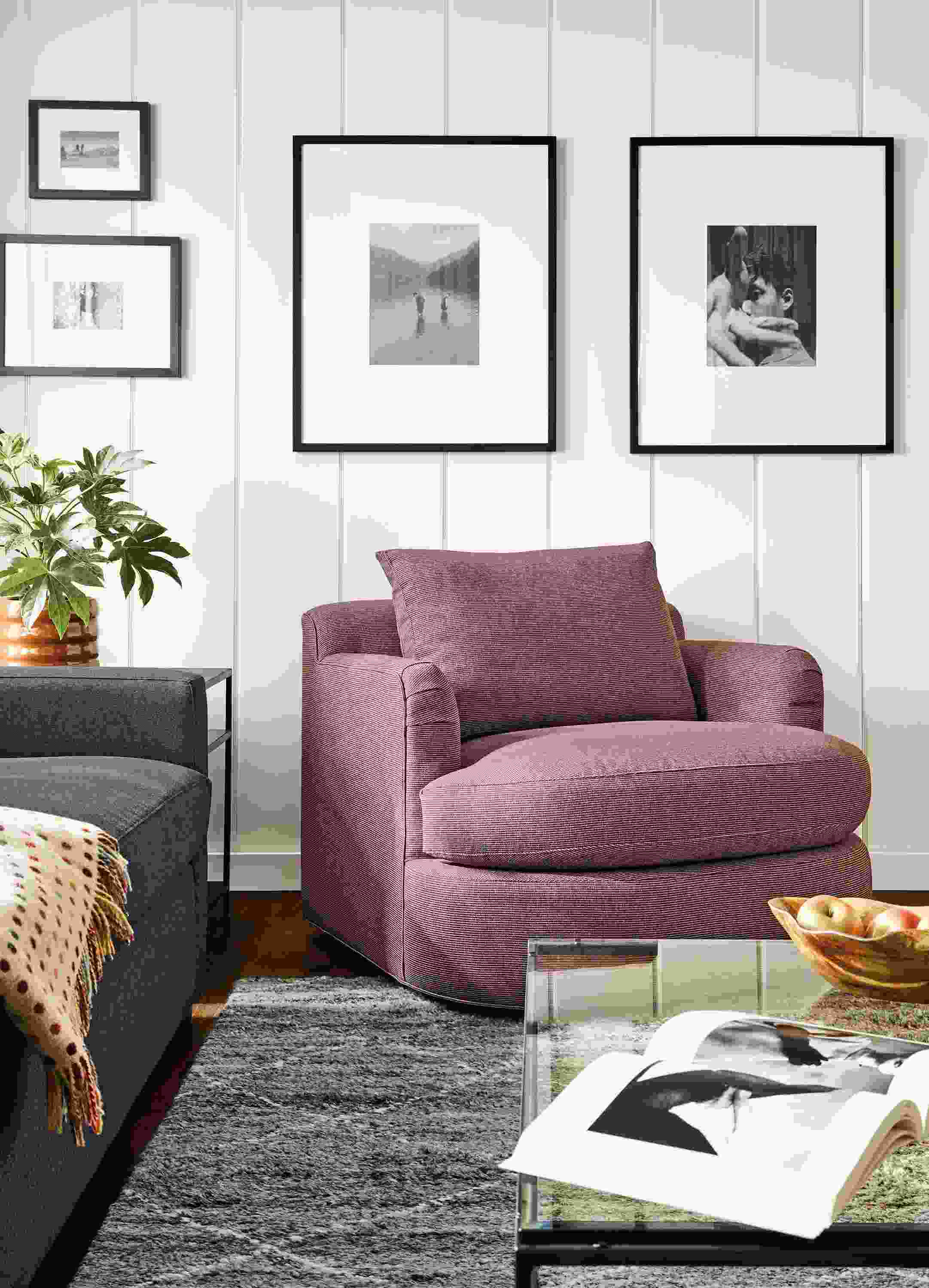 Living room with Sonja swivel chair in Kesler Merlot, Ryan sofa in Myers Navy and Kalindi rug in charcoal.