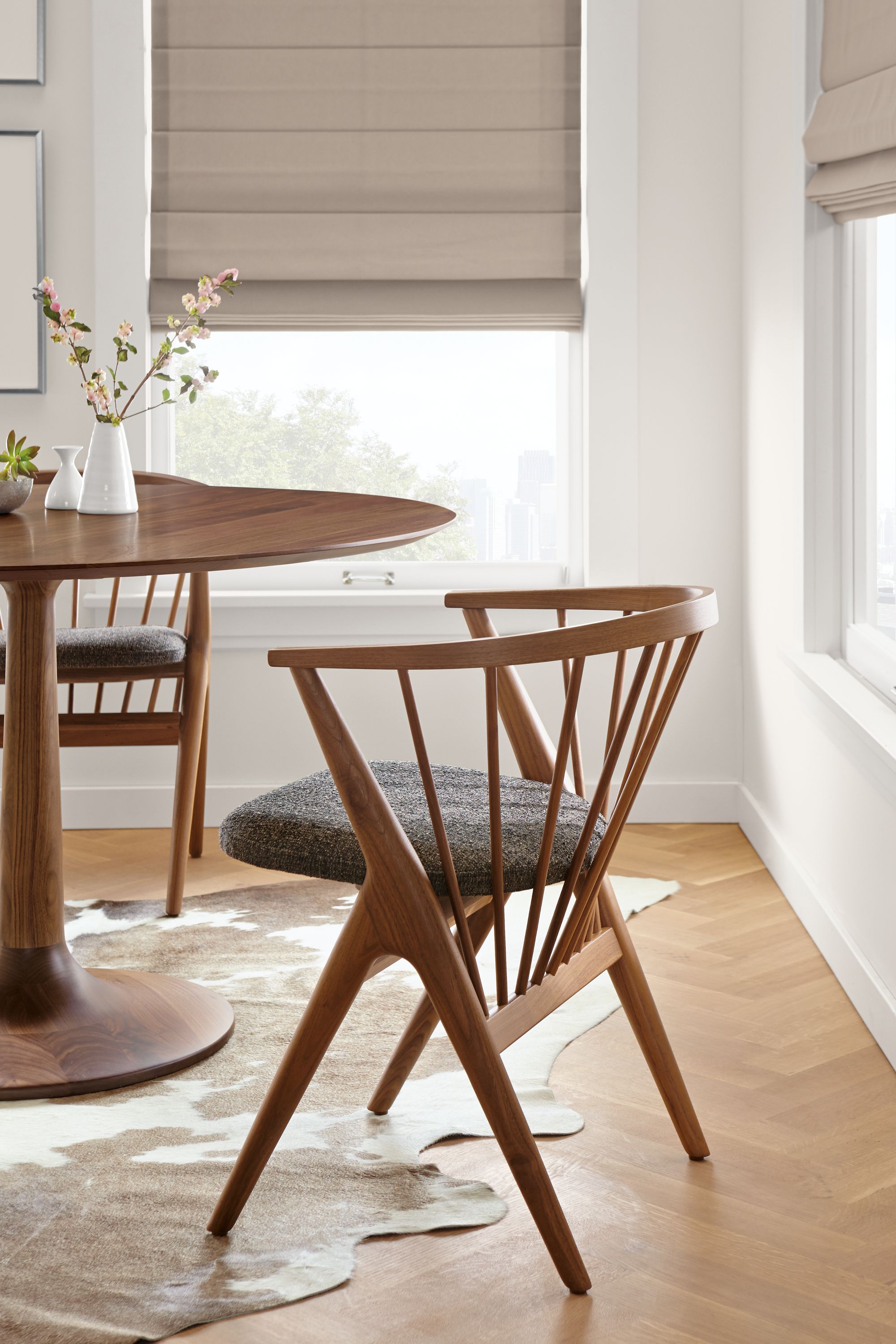 Dining room with Soren dining chair in walnut and tamm charcoal.