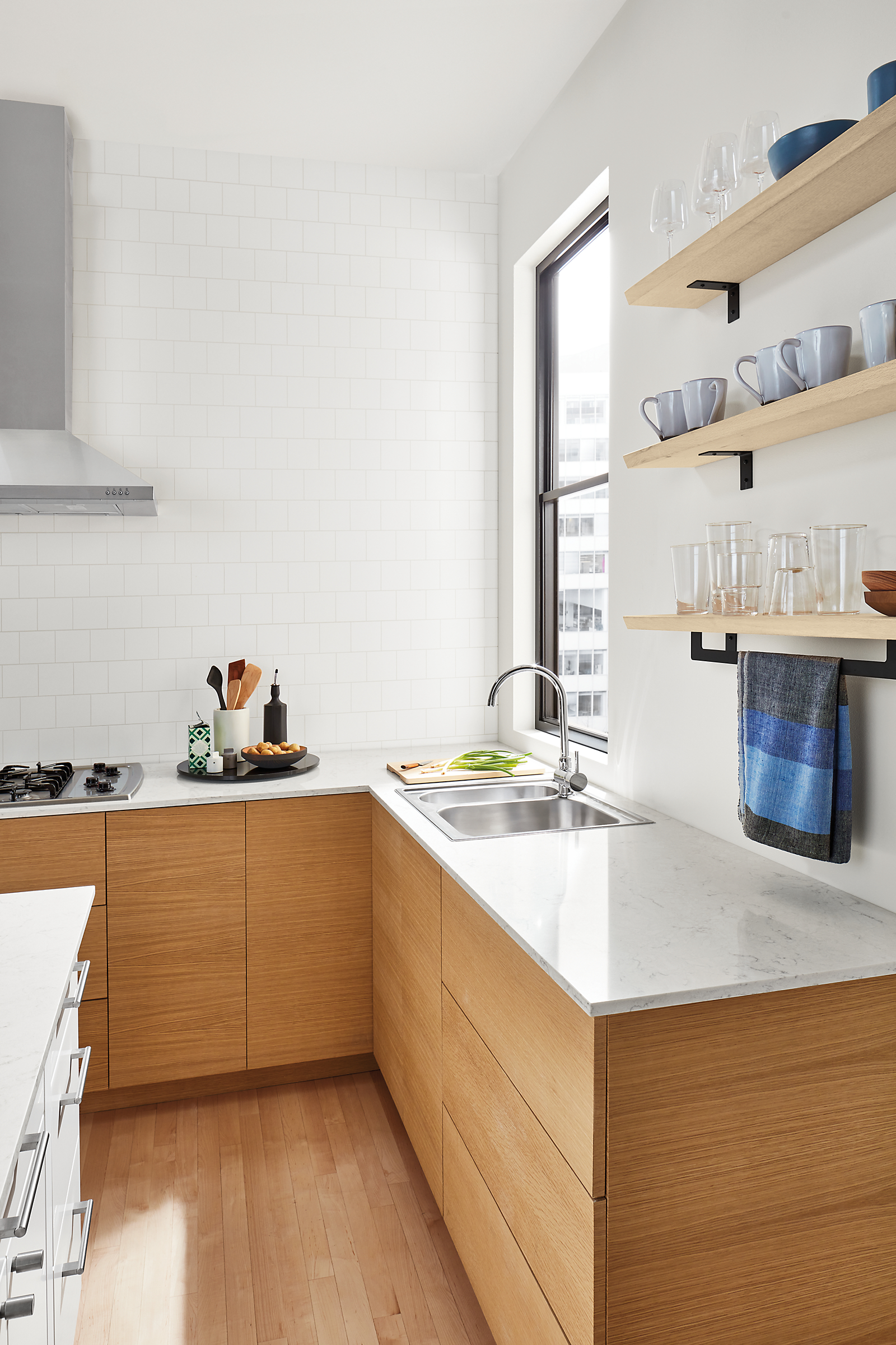 modern kitchen with stanley shelves, afar tea towel, nadia glasses.