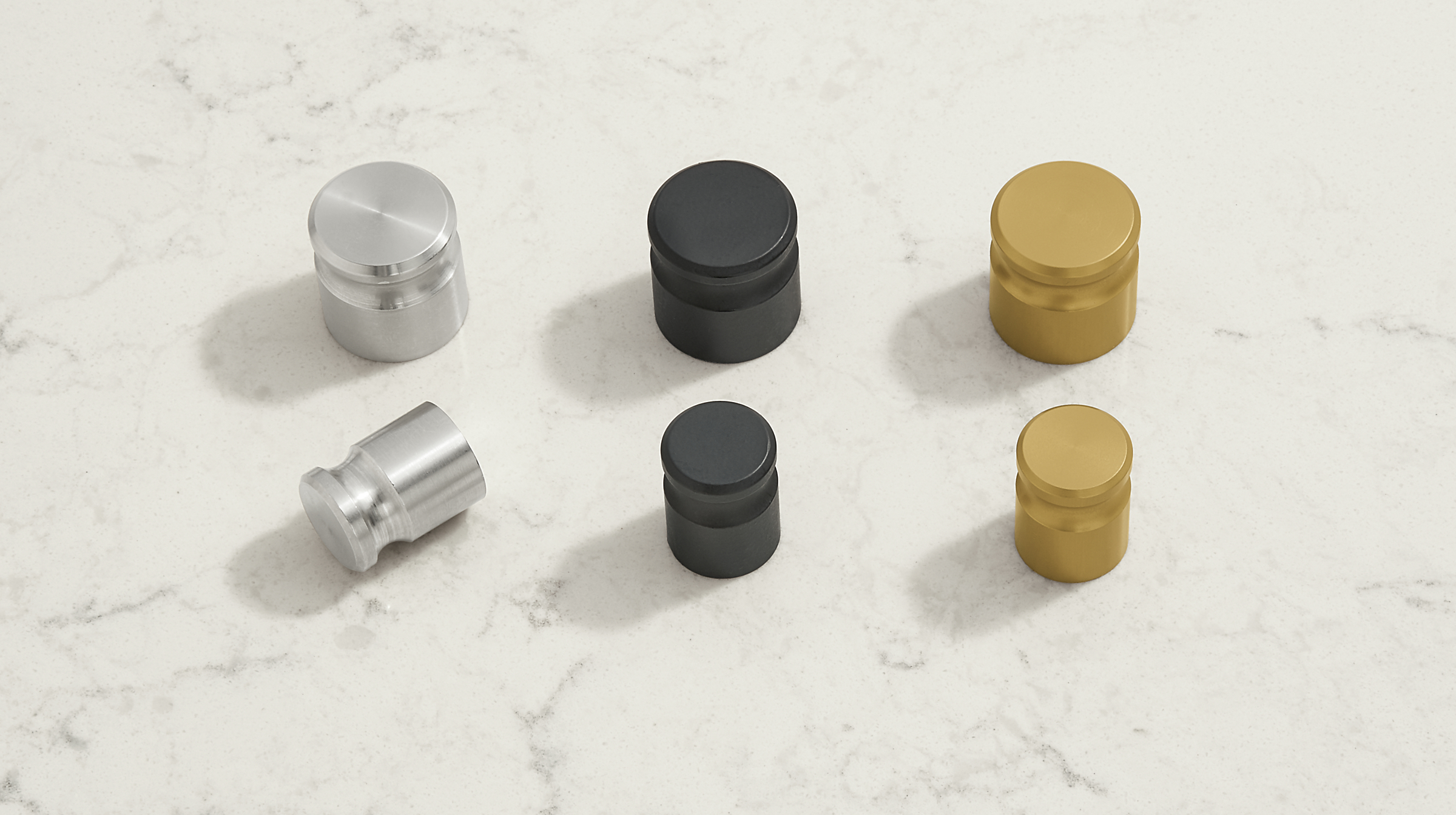 stanwell knobs in stainless steel, graphite, brushed gold.