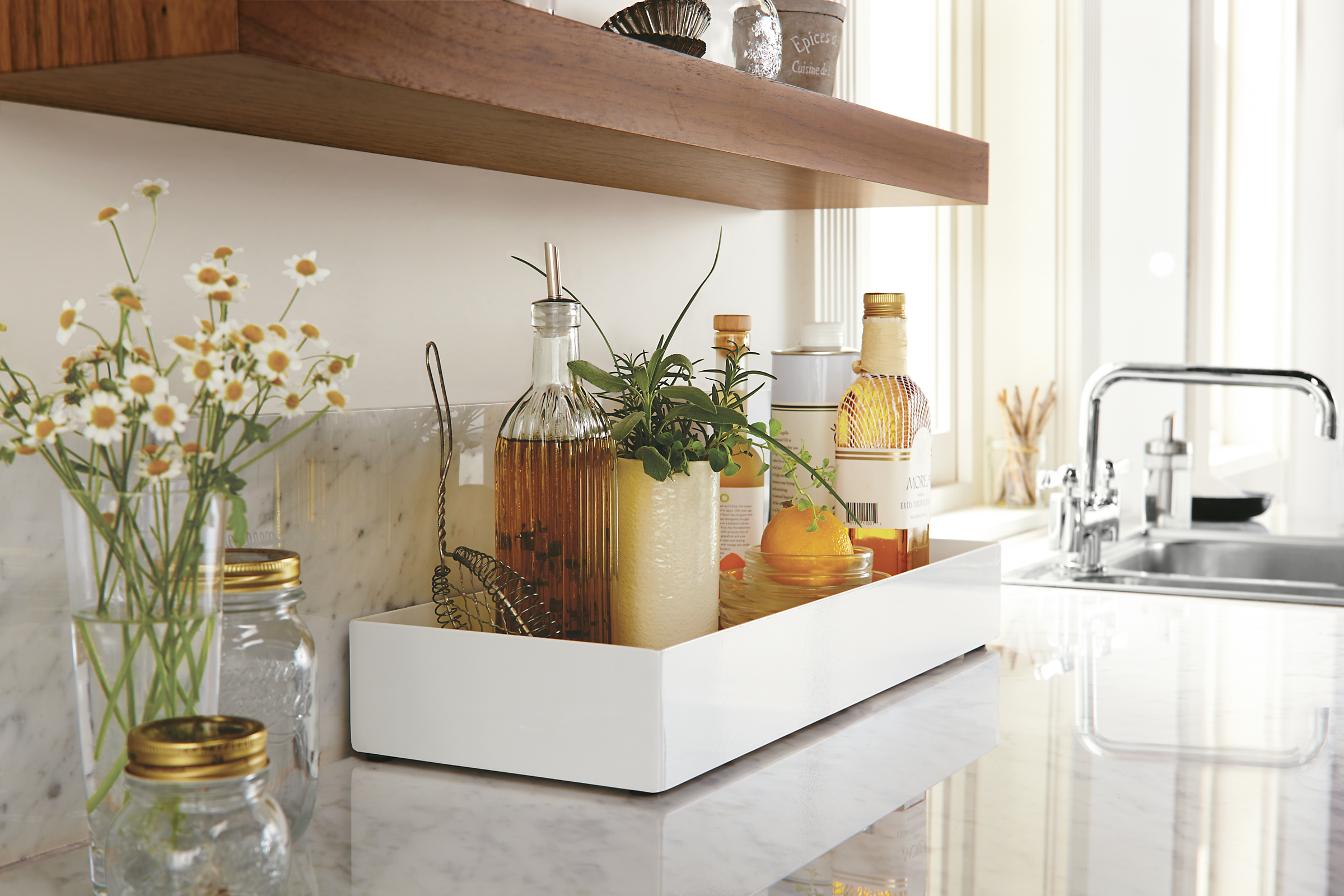 Kitchen with Steel rectangle centerpiece planter in white.