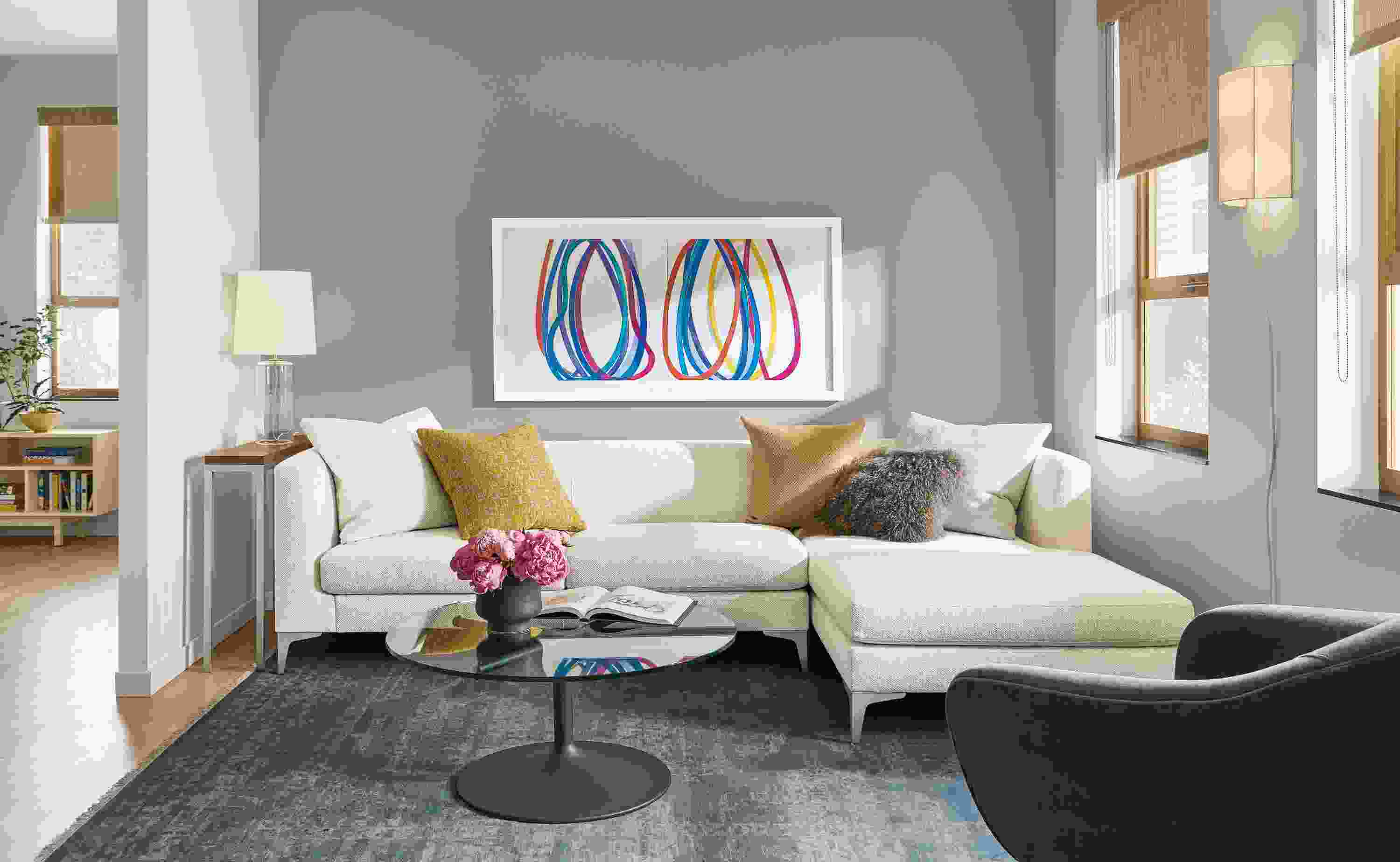 Detail of 110 inch sterling sofa with right arm chaise in arin ivory fabric.