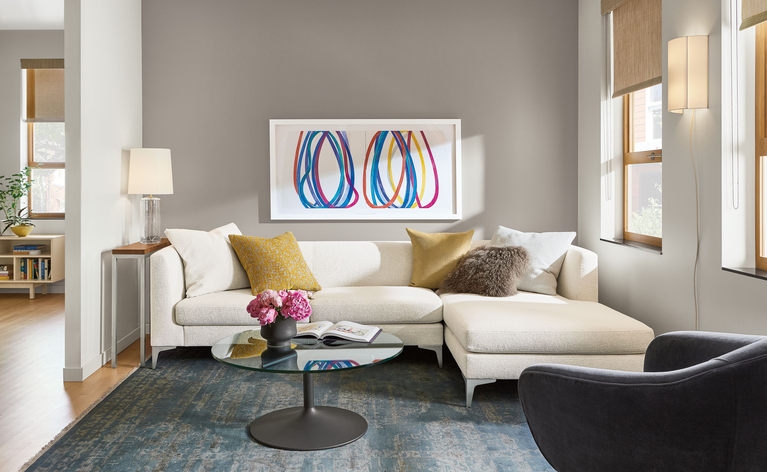 Detail of 110 inch sterling sofa with right arm chaise in arin ivory fabric.