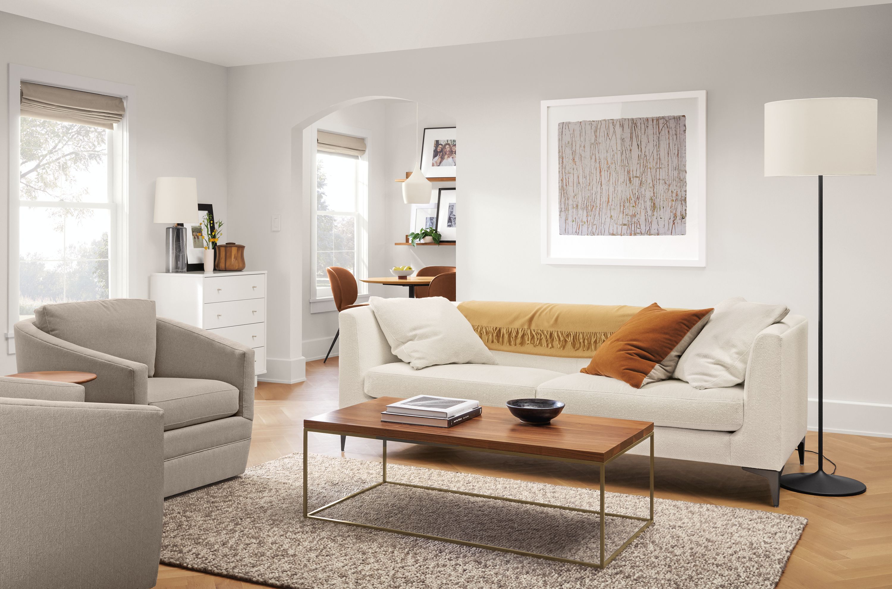 room setting with sterling sofa, ford swivel chairs, tyne coffee table, hastings rug.