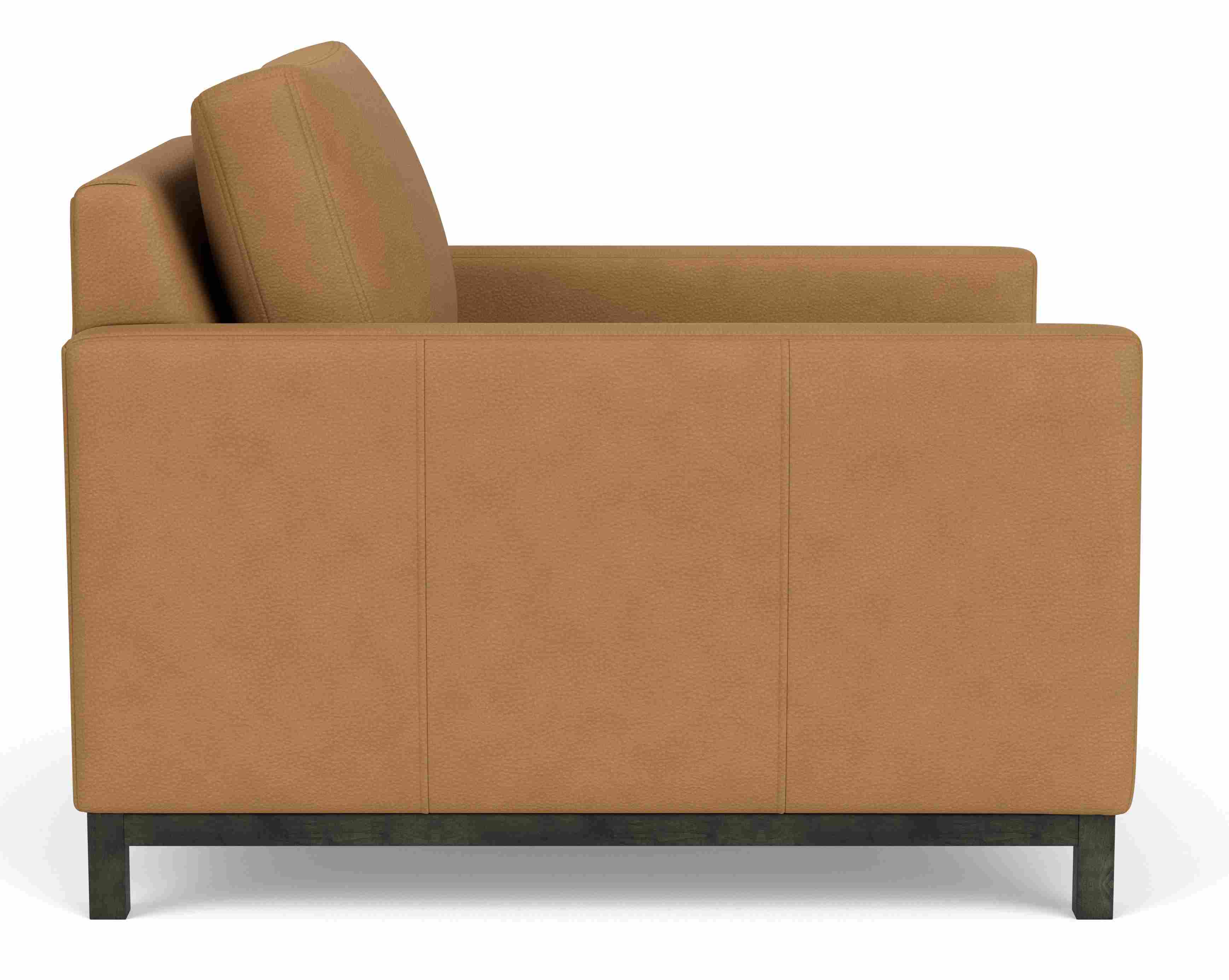 Side view of Stevens Deep Chair in Laino camel leather.