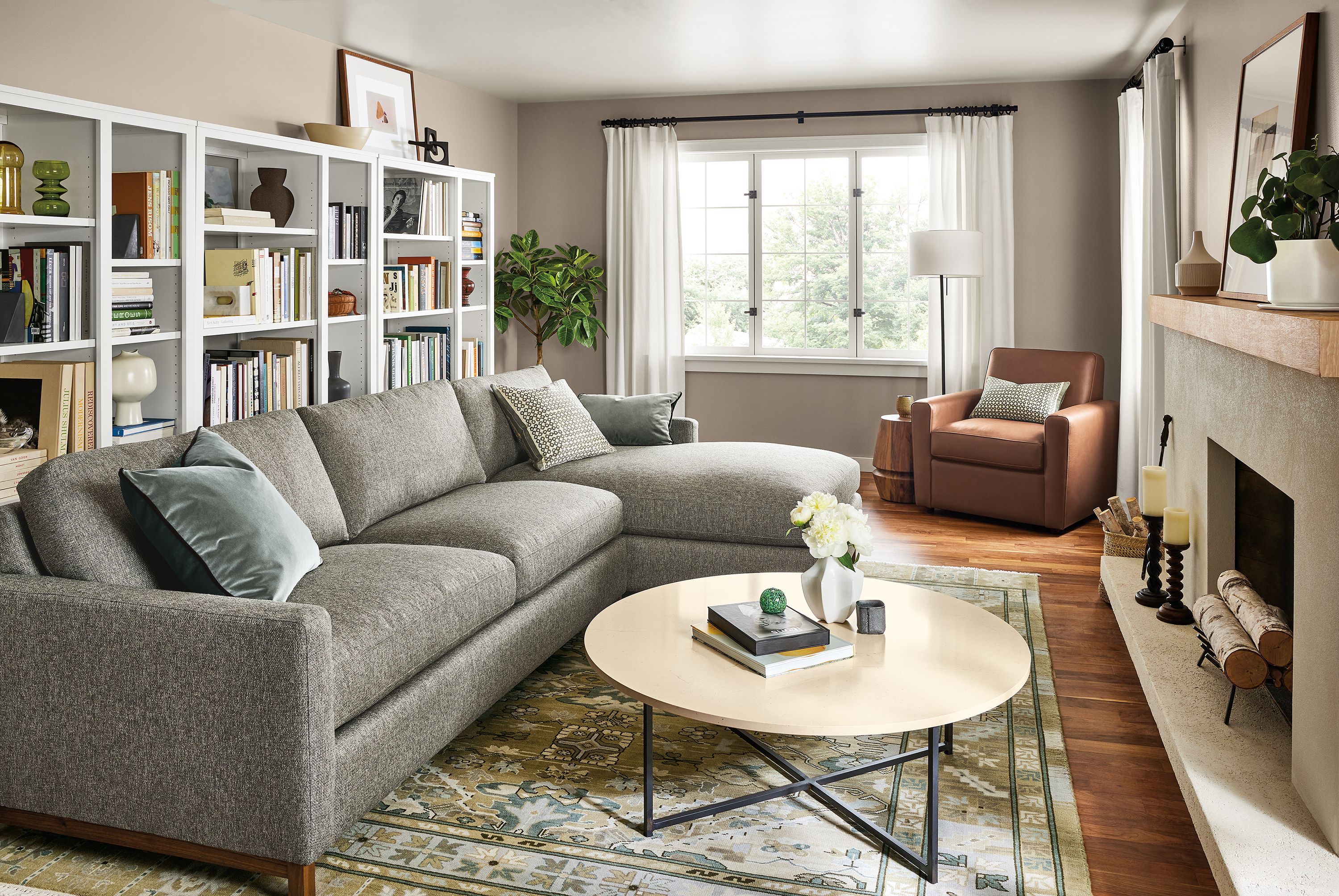 Living room with Stevens sectional, Classic coffee table, Kayseri rug.