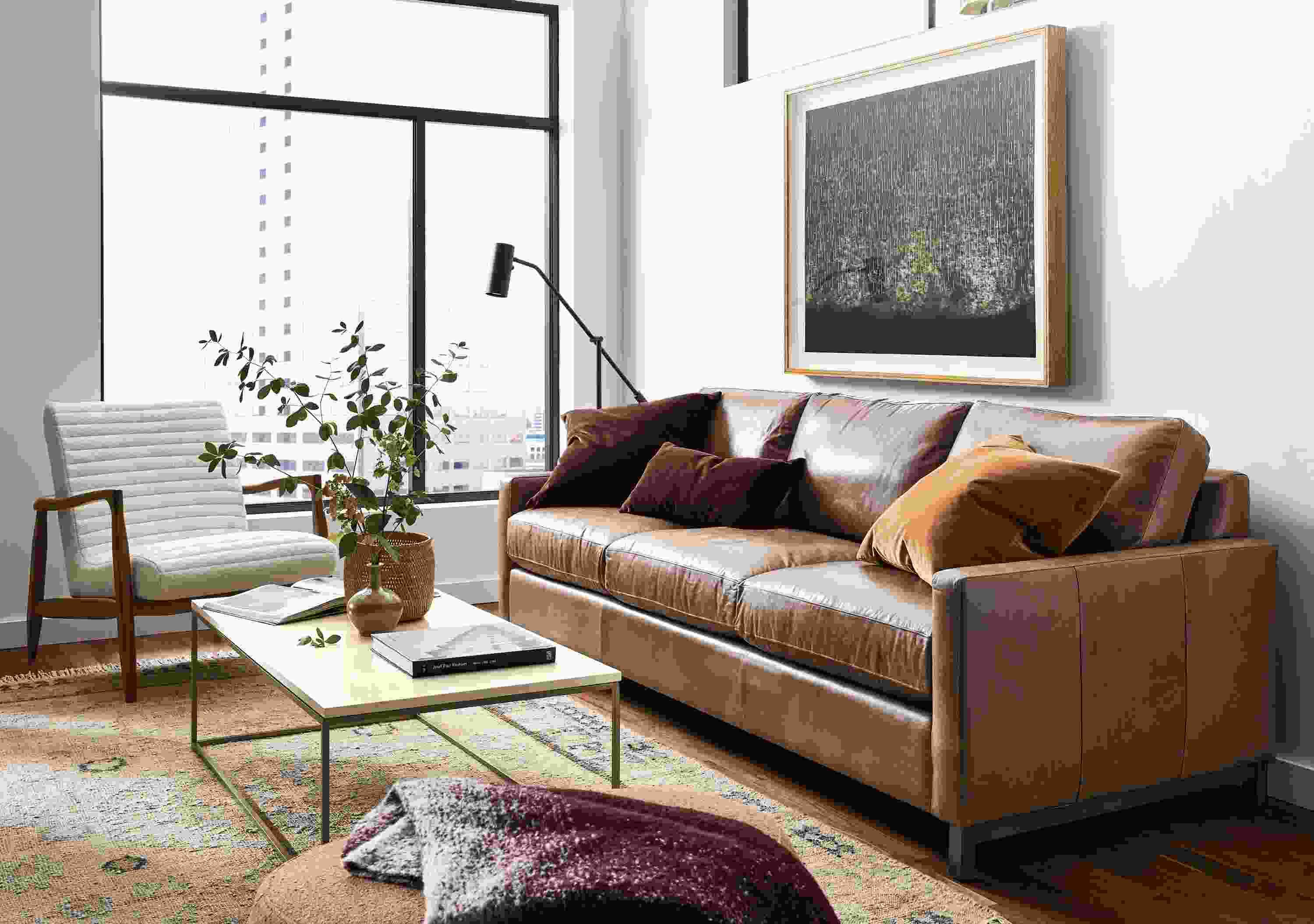 room with stevens sofa in vento leather, callan chair and asher ottoman.
