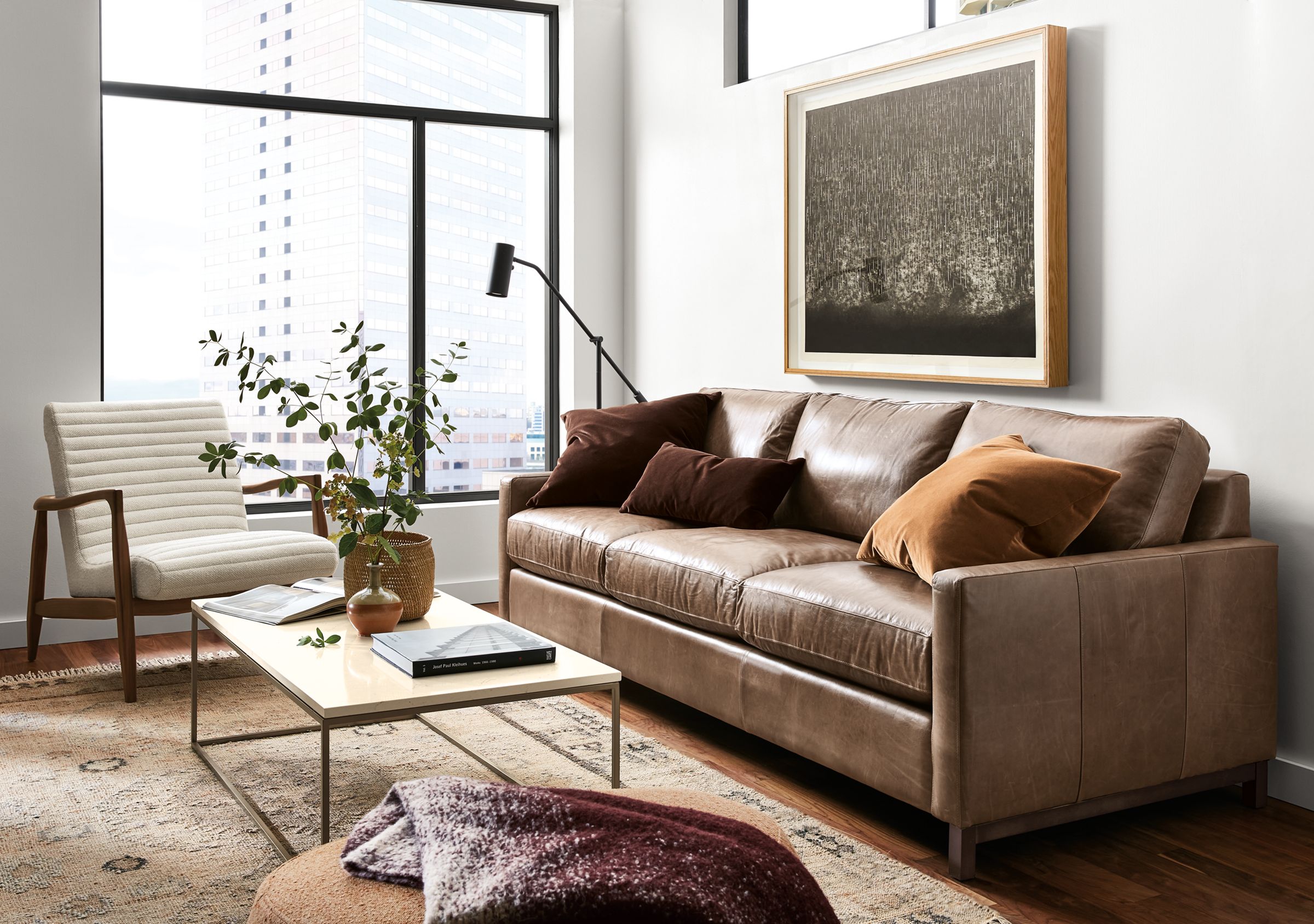 room with stevens sofa in vento leather, callan chair and asher ottoman.