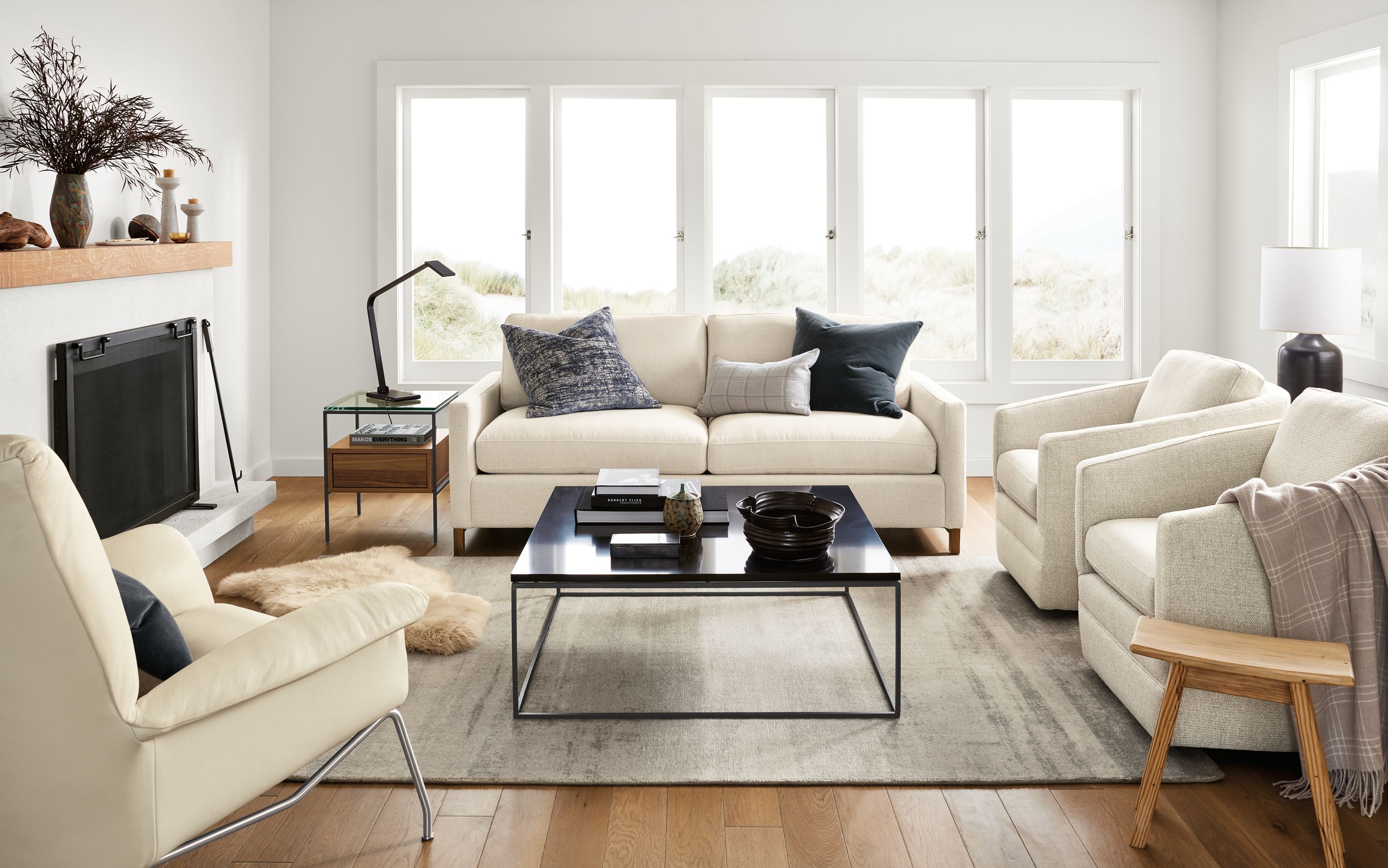 room with 81-wide sofa in sumner fabric, paris chair and ford swivel chair.