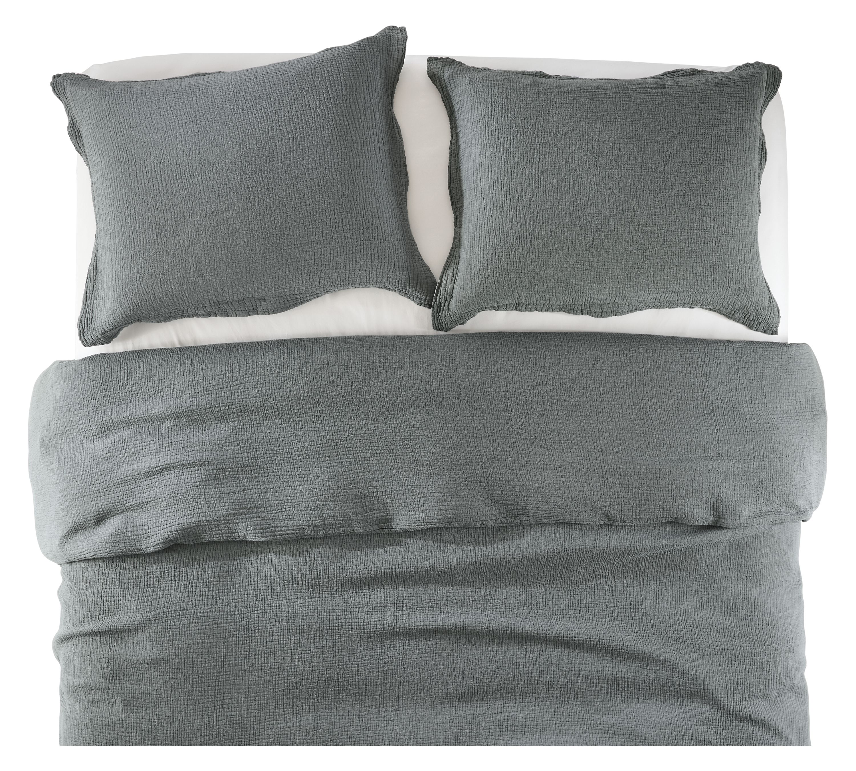 Overhead view of core queen bed with strand gauze duvet set in dusk and percale sheets in white.
