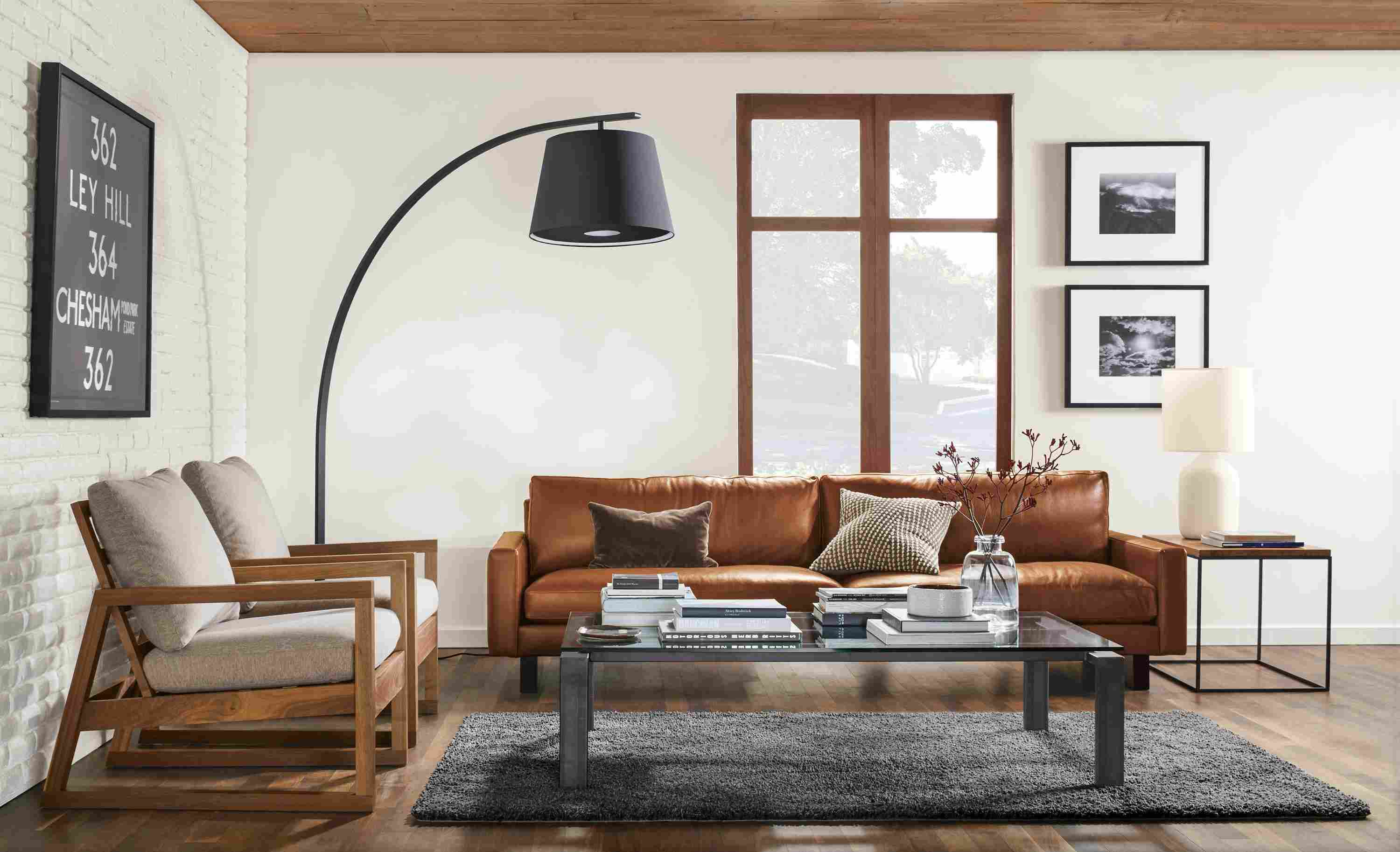 Detail of streeter floor lamp with graphite stand and black shade.