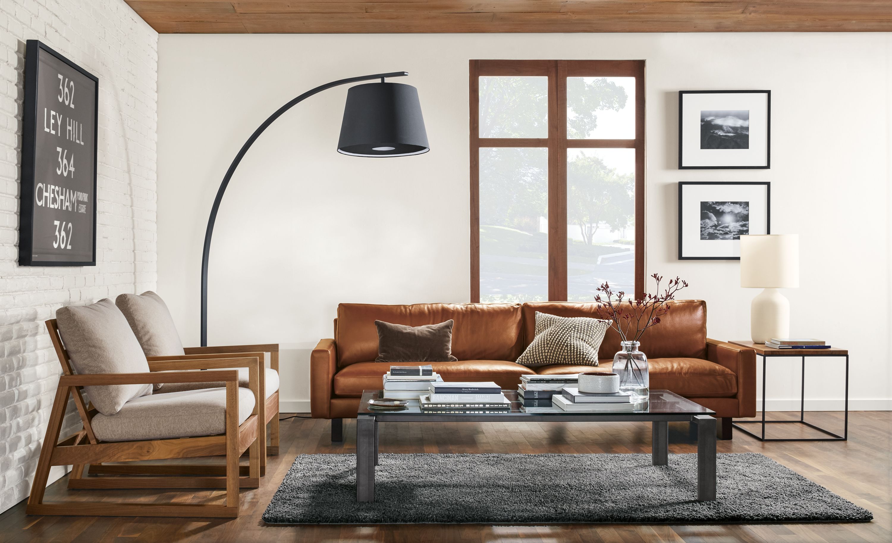 Coffee table with clear glass top, natural steel base