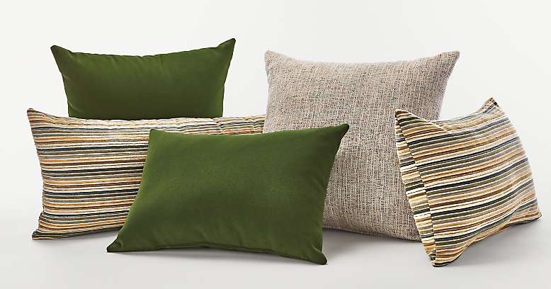 Collection of outdoor pillows in green and taupe.