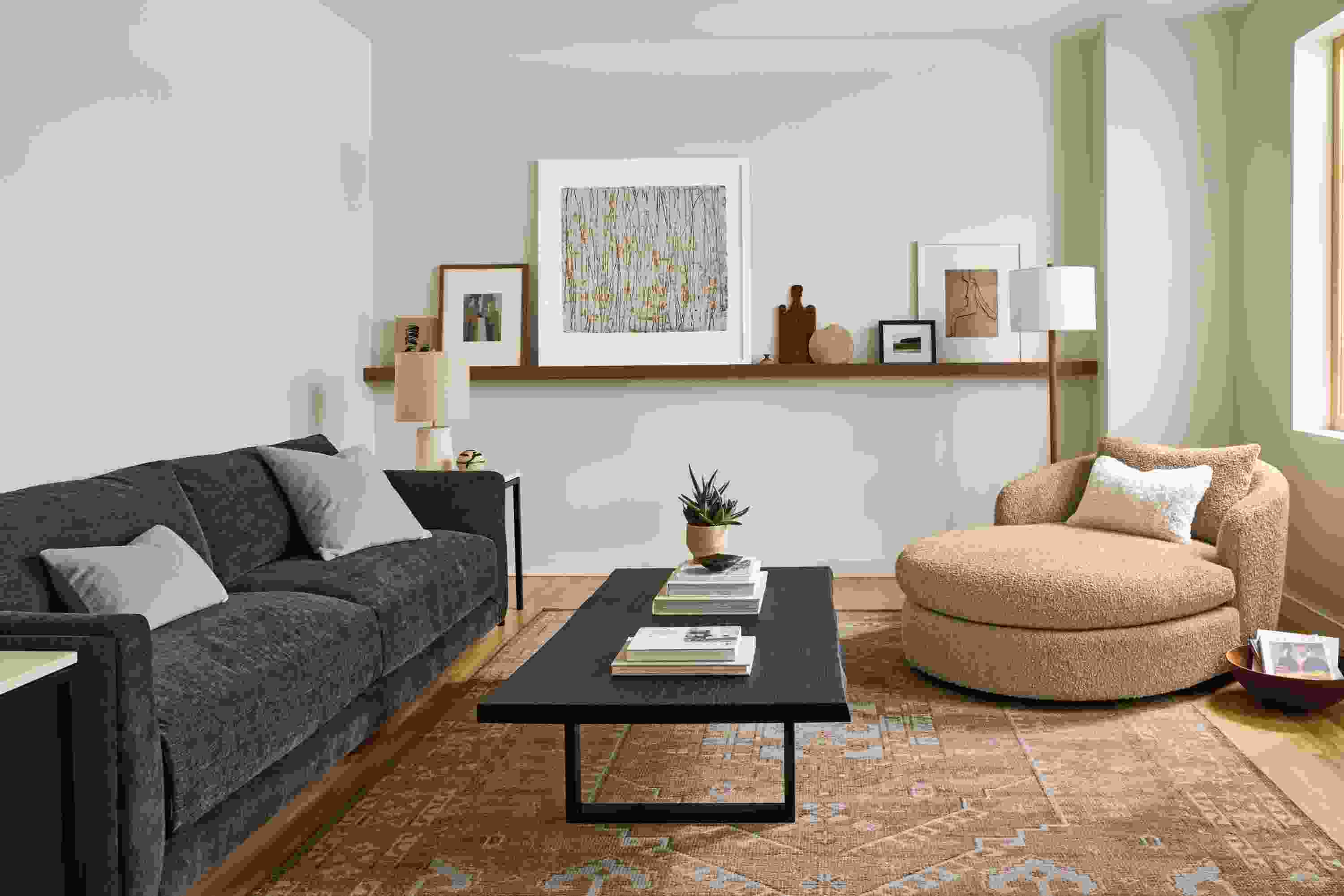 Living room with Suri chaise in Dornick Camel, Clemens sofa in Mori Charcoal and Darrah 8 by 10 rug in camel.