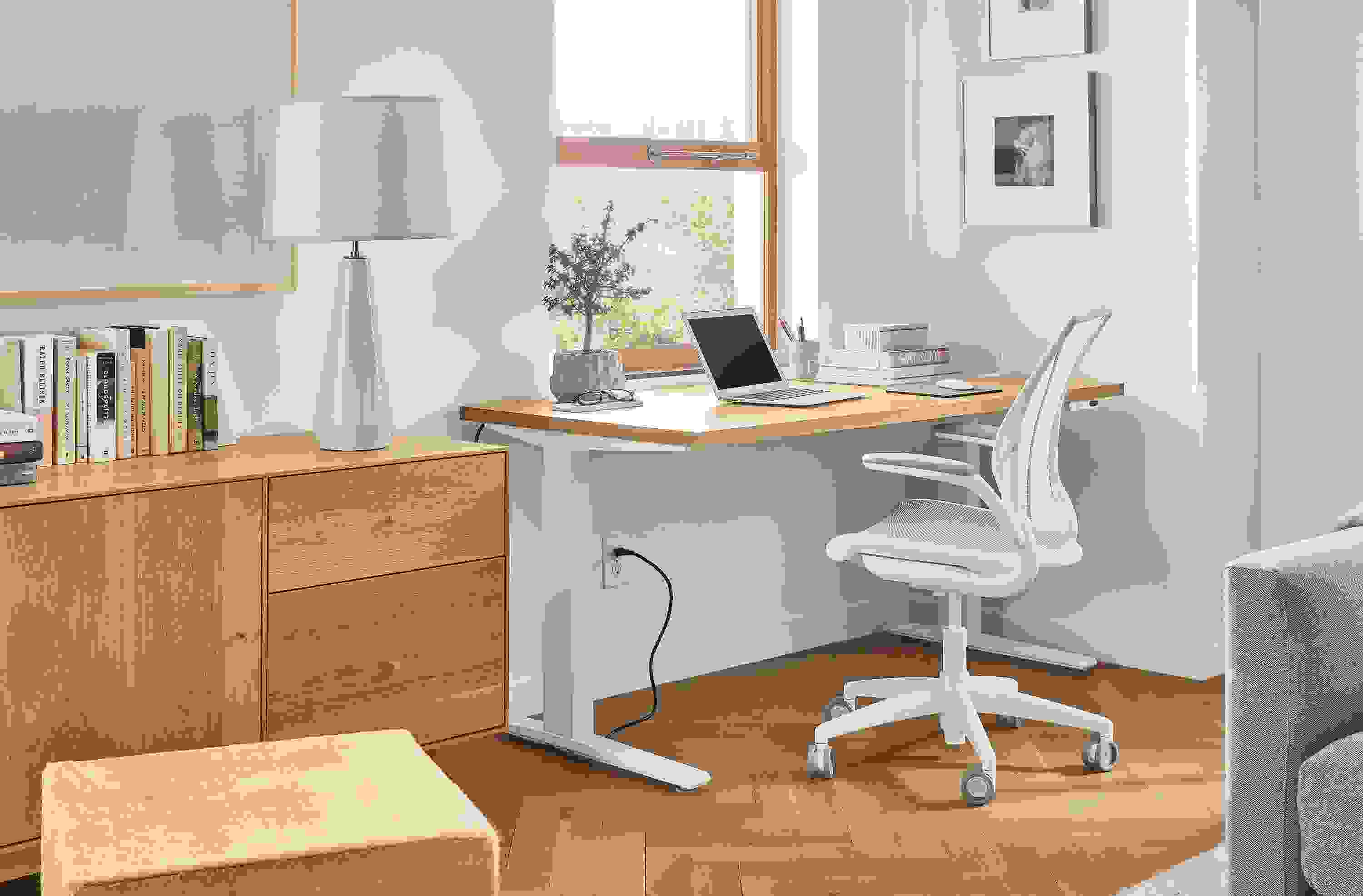 room setting including SW desk, diffrient world chair, hudson file cabinet, kalindi rug.