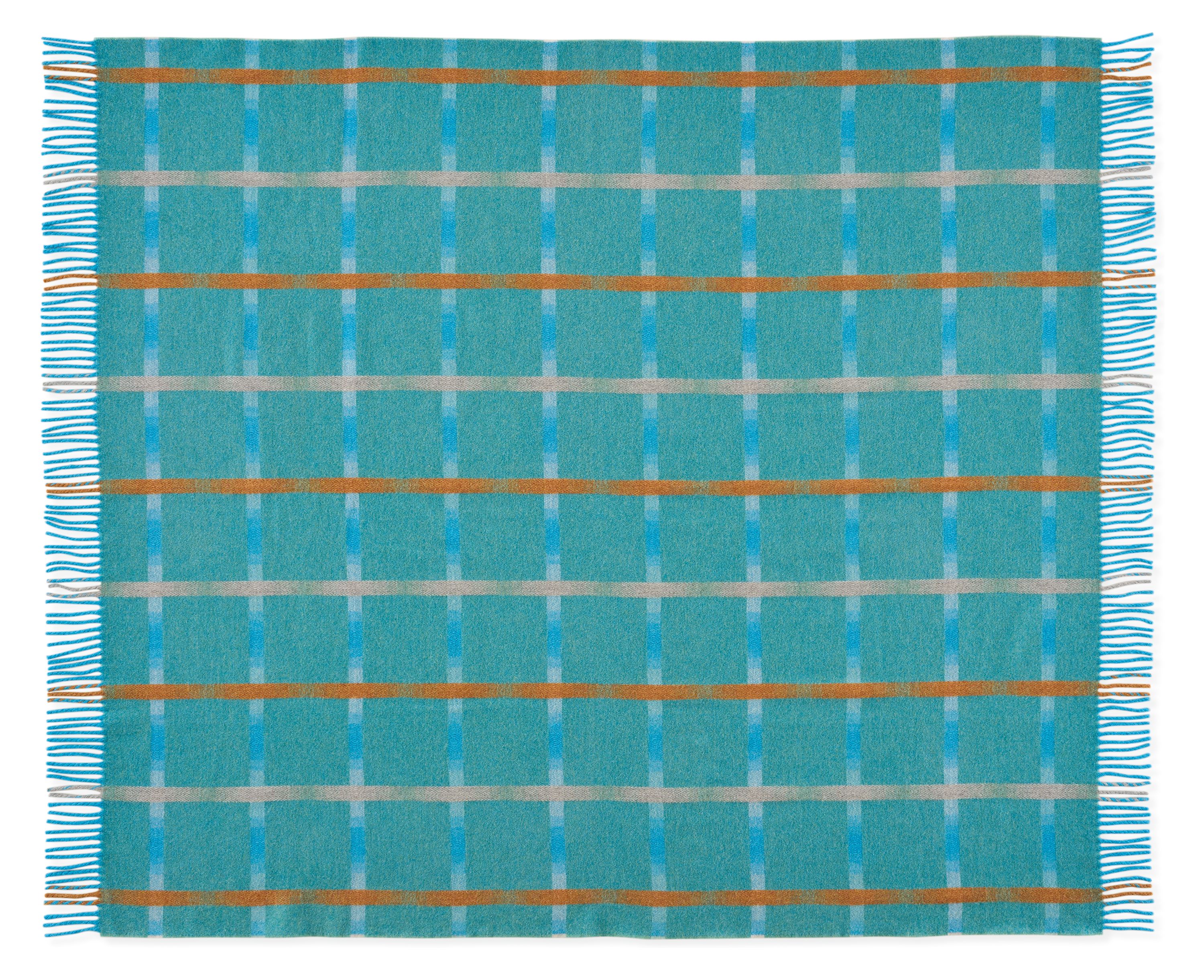 Overhead view of tahoe throw blanket in peacock.