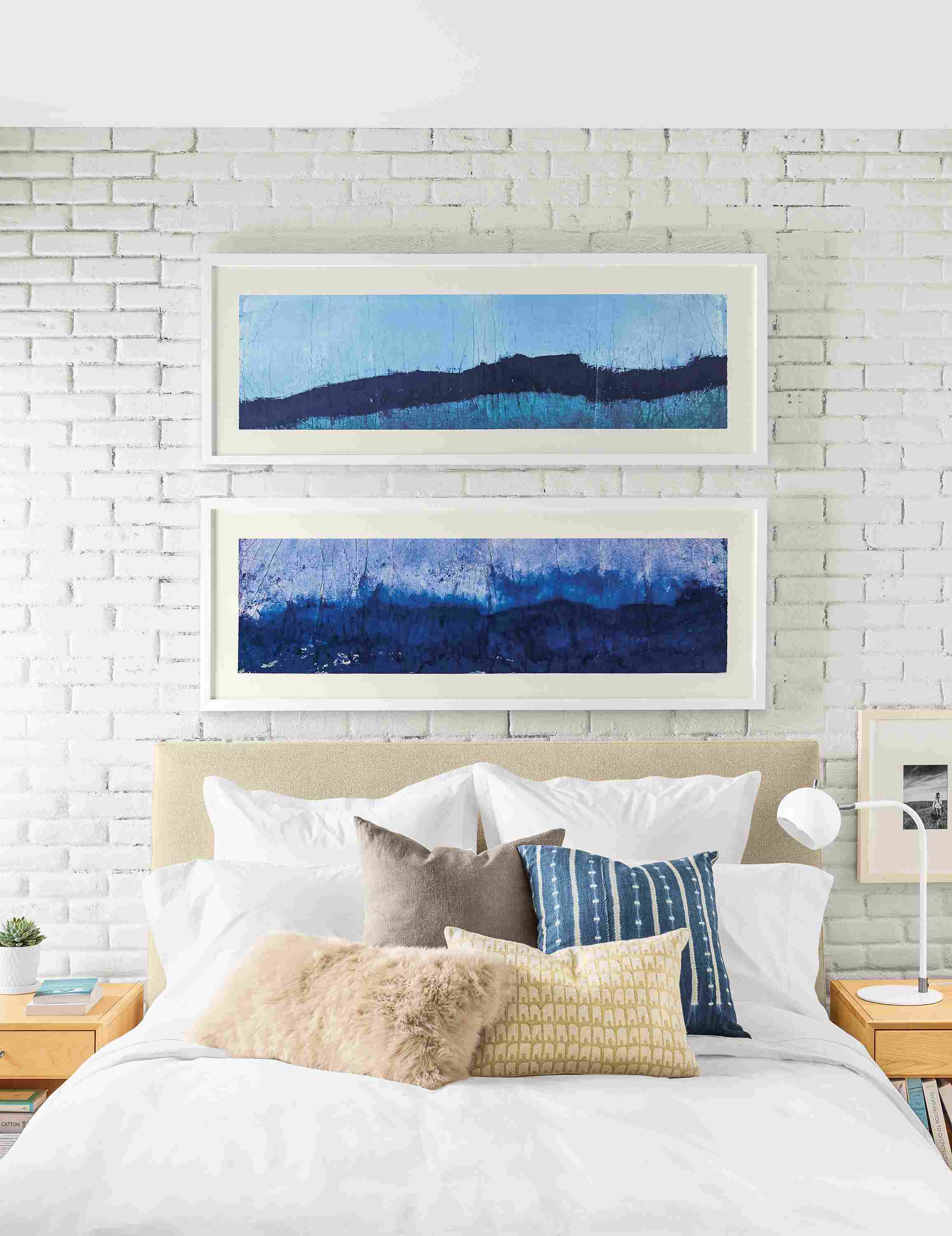 room setting including chantal talbot artwork, ella queen bed, delano nightstands.