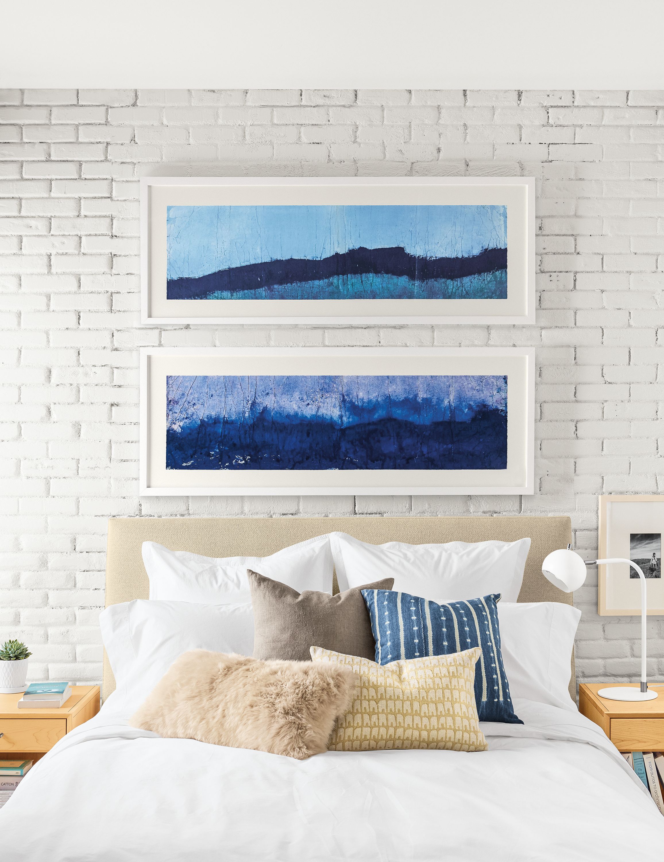 room setting including chantal talbot artwork, ella queen bed, delano nightstands.