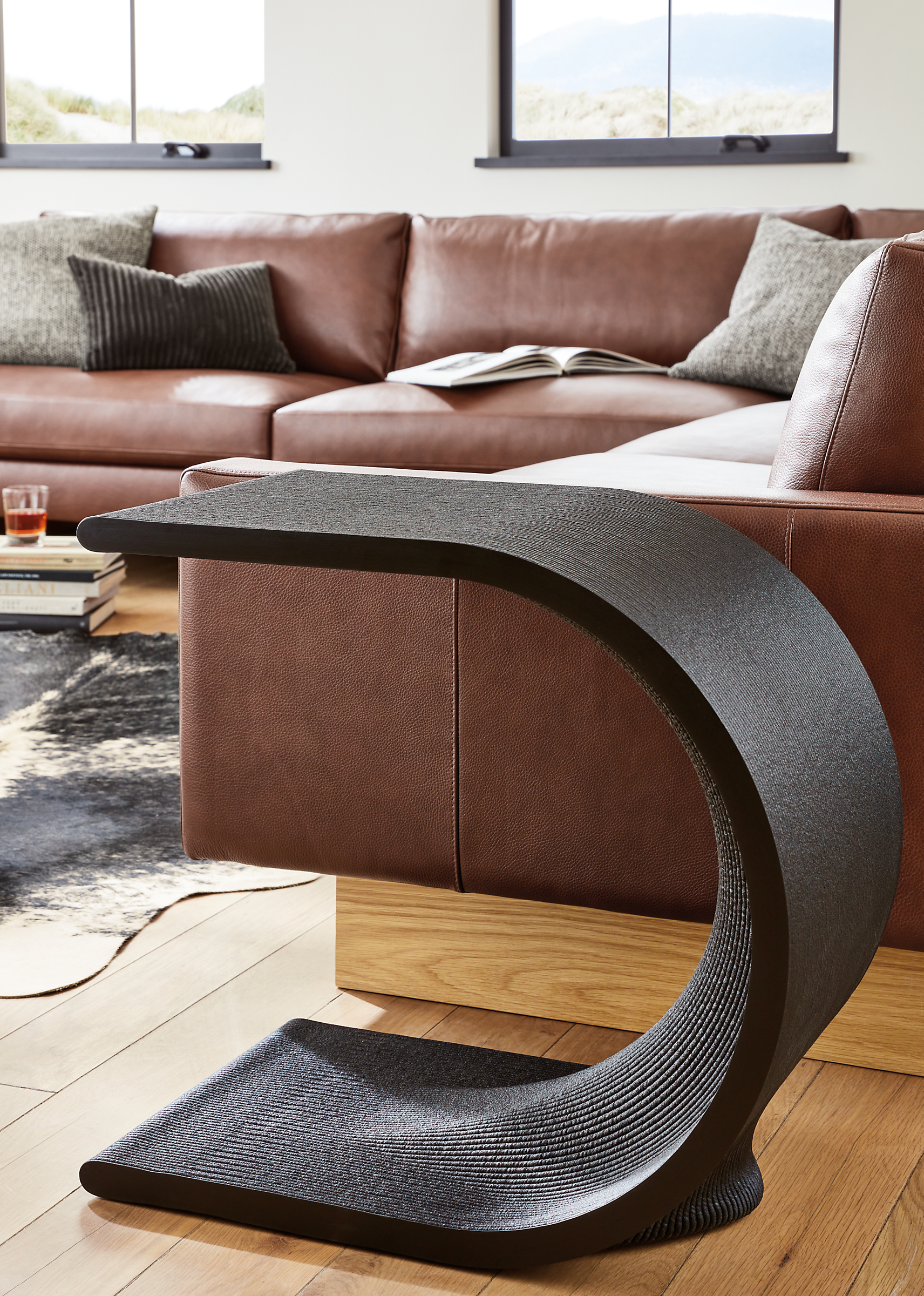 detail of tangent c-table in living room beside pierson sectional