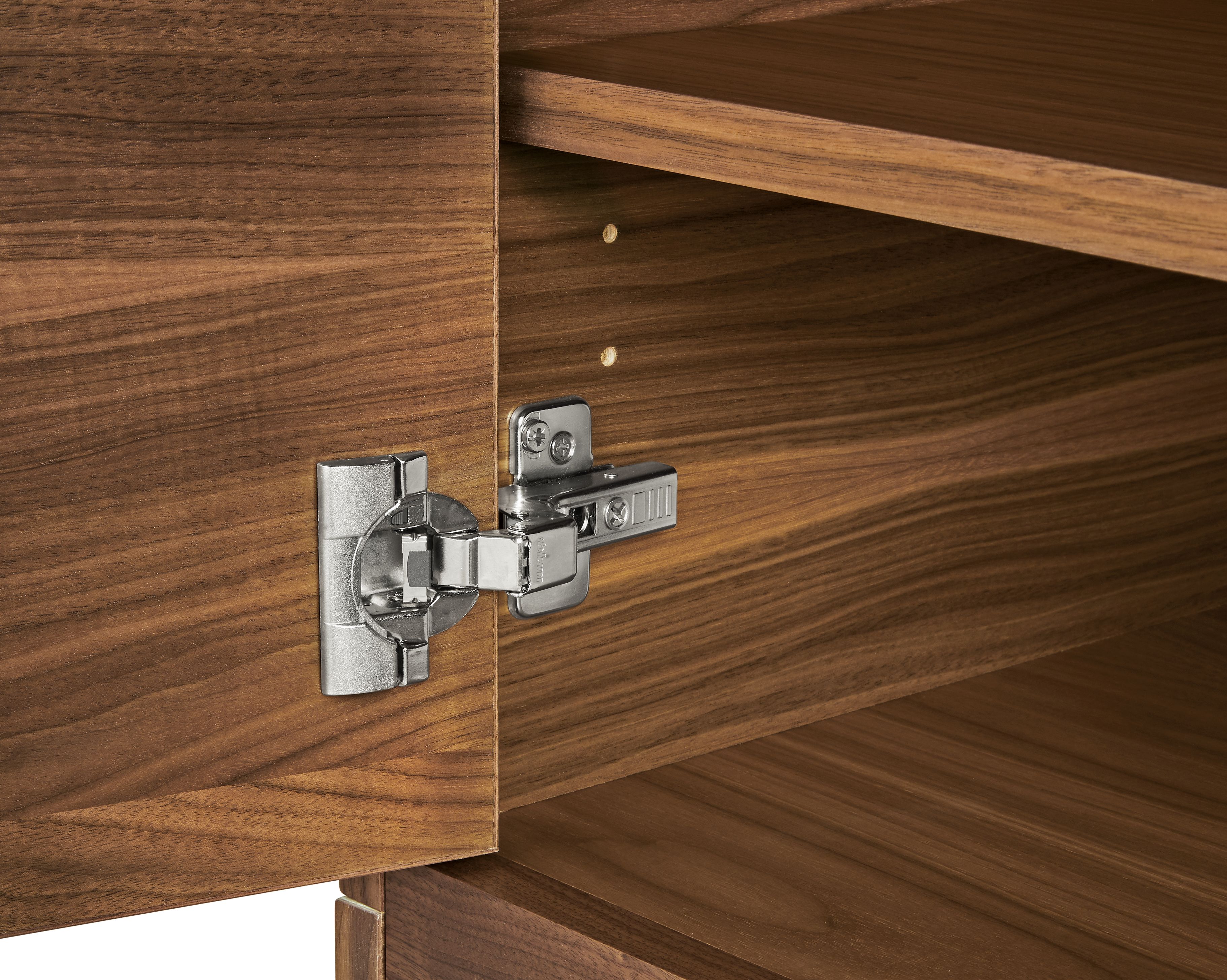 close-up of taylor storage cabinet door hinge.