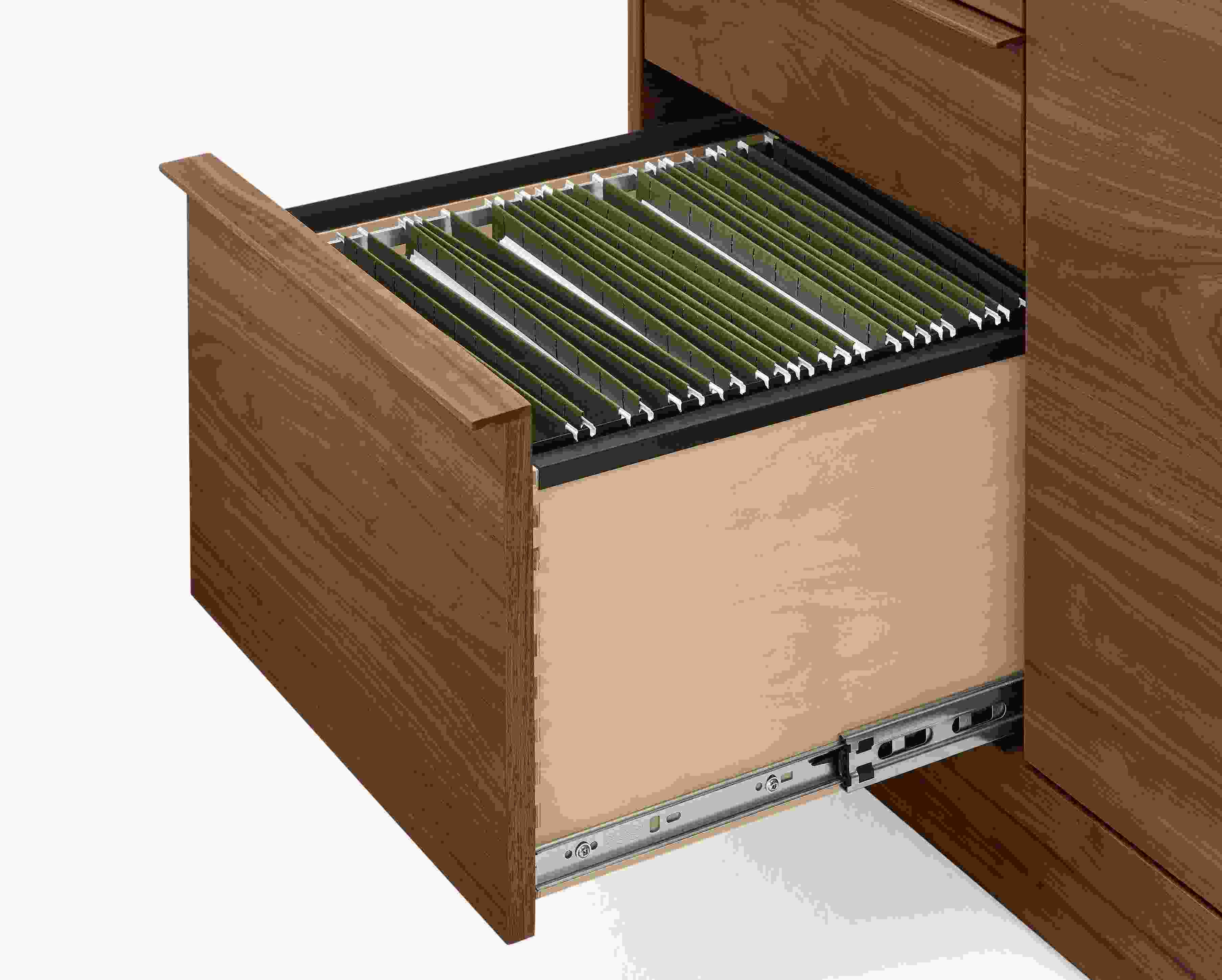 Detail of open drawer with letter size file folders on a Taylor 36-wide office armoire in walnut.
