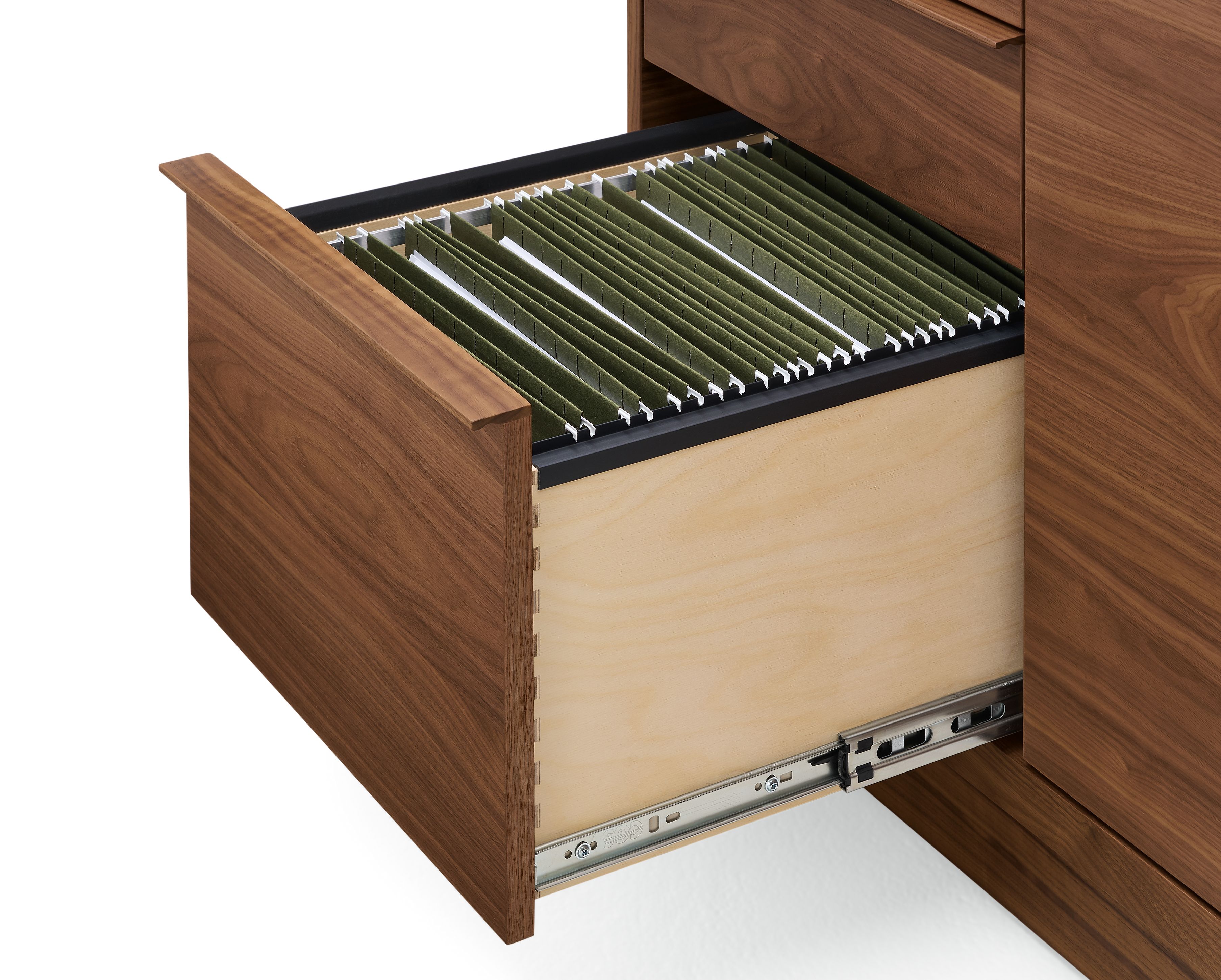 Detail of open drawer with letter size file folders on a Taylor 36-wide office armoire in walnut.