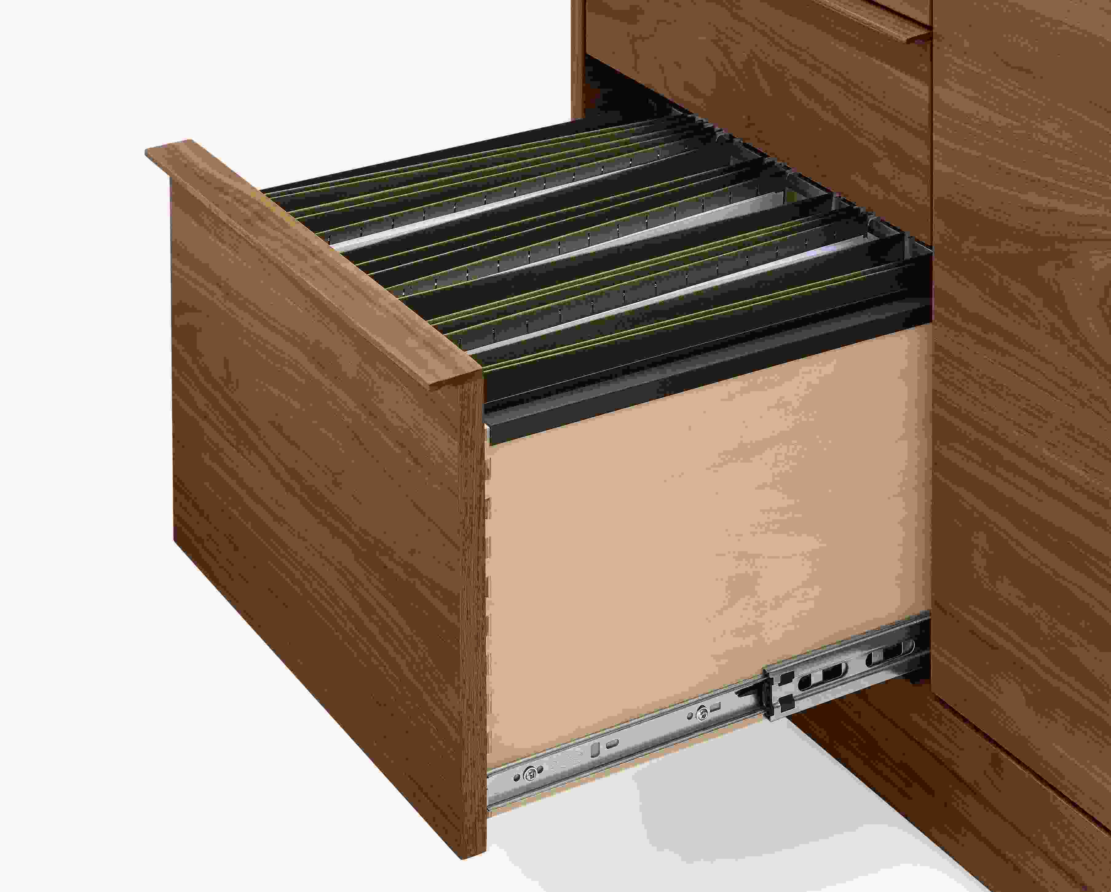 Detail of open drawer with legal size file folders on a Taylor 36-wide office armoire in walnut.