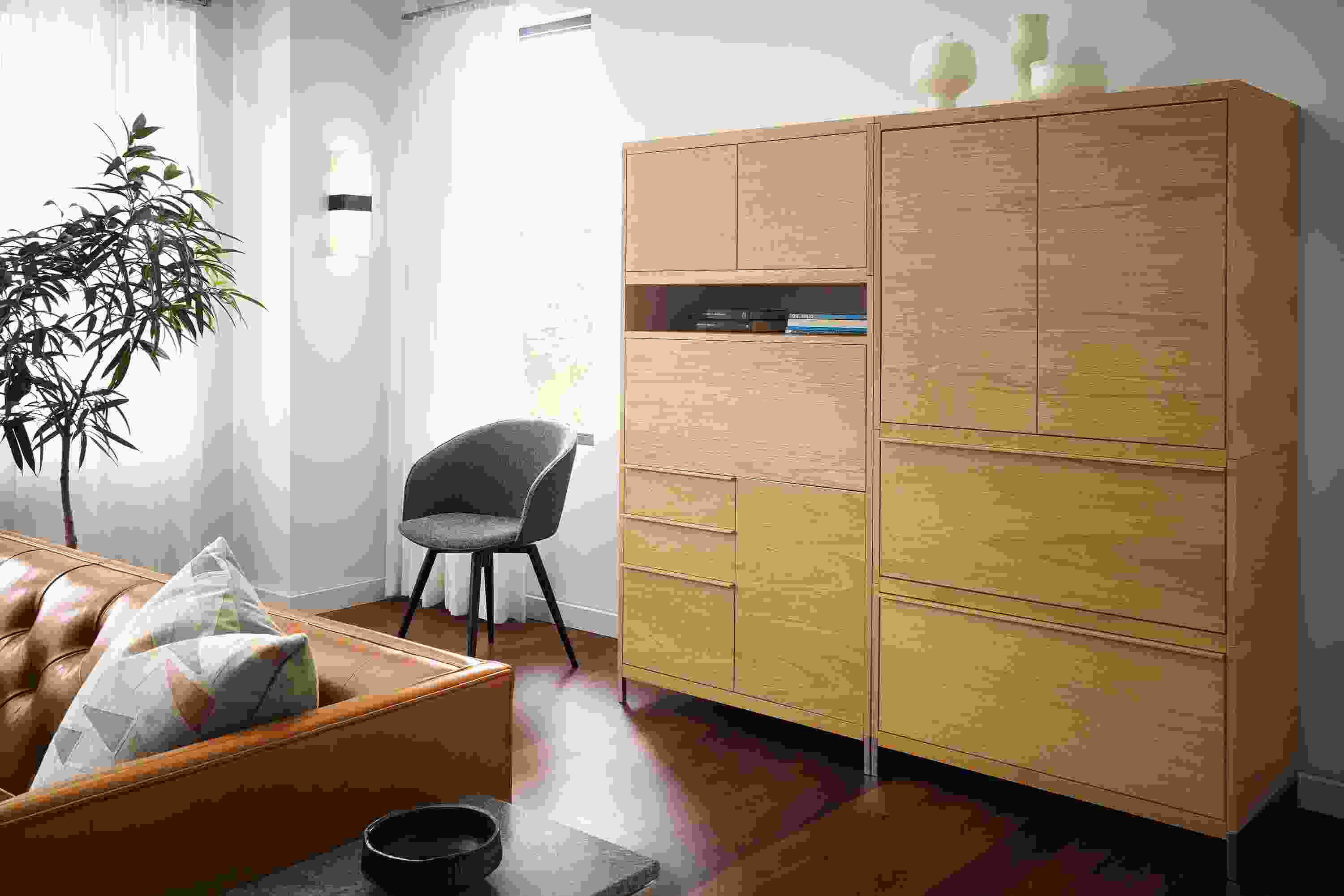 Detail of Taylor office wall unit piece in white oak with drop-down desk upright.
