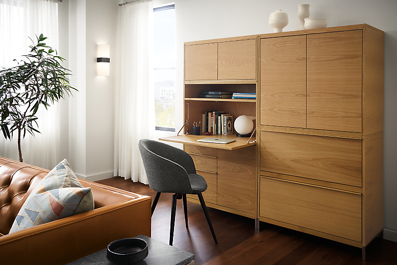 detail of tayor office wall unit piece in white oak with drop-down desk extended.