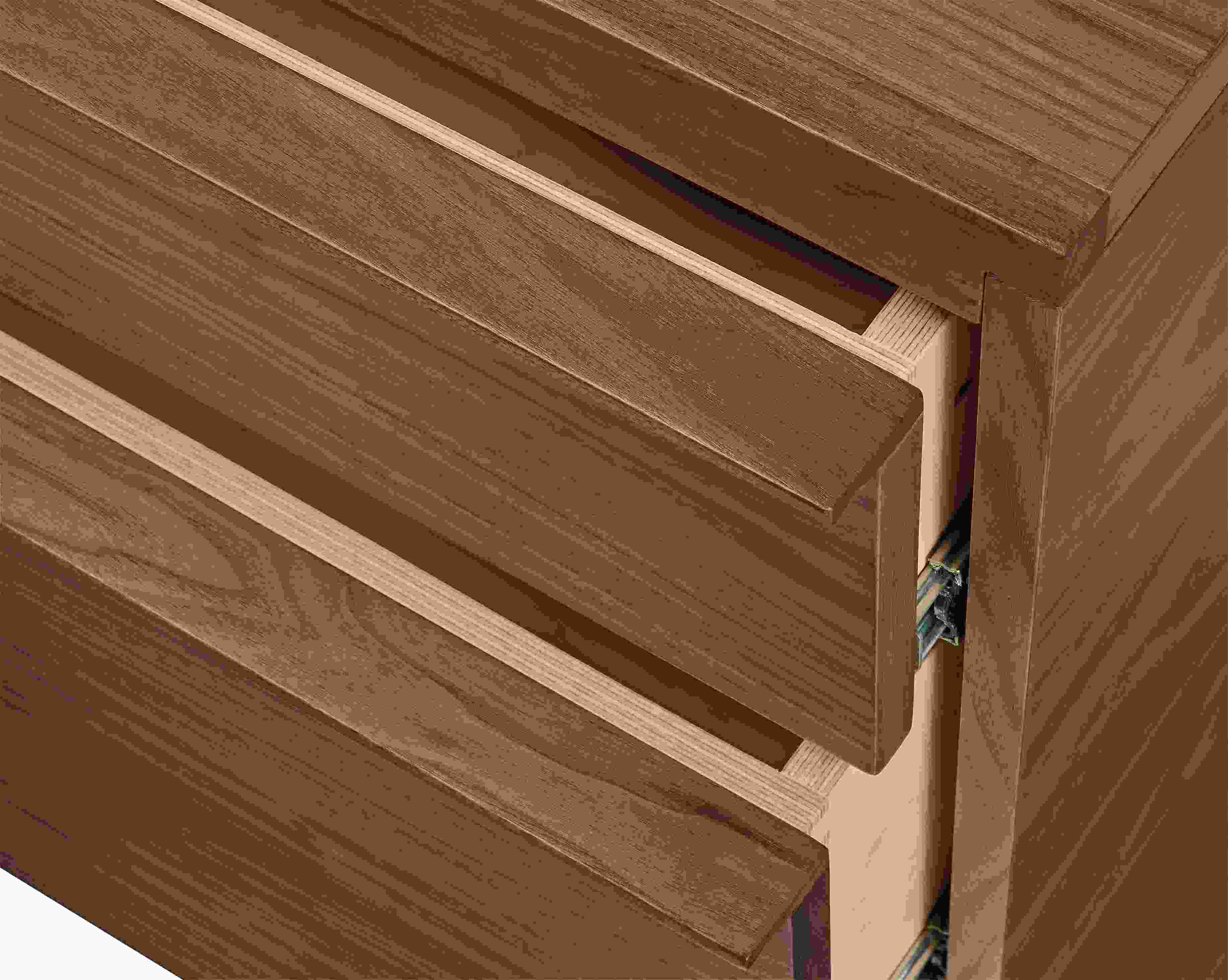 close-up of corner of taylor storage cabinet drawers partially open.