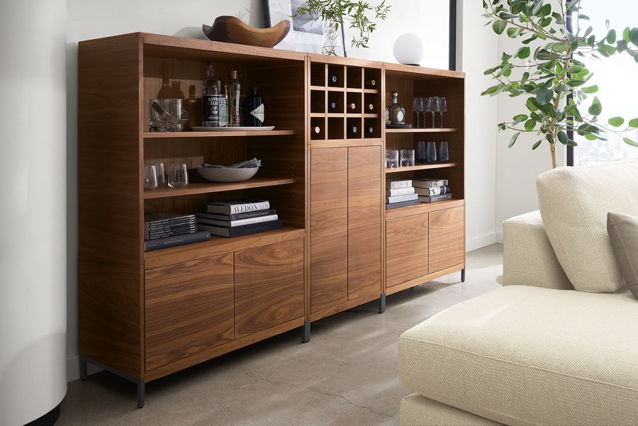 living room with taylor bookcase wall unit in walnut with steel base.