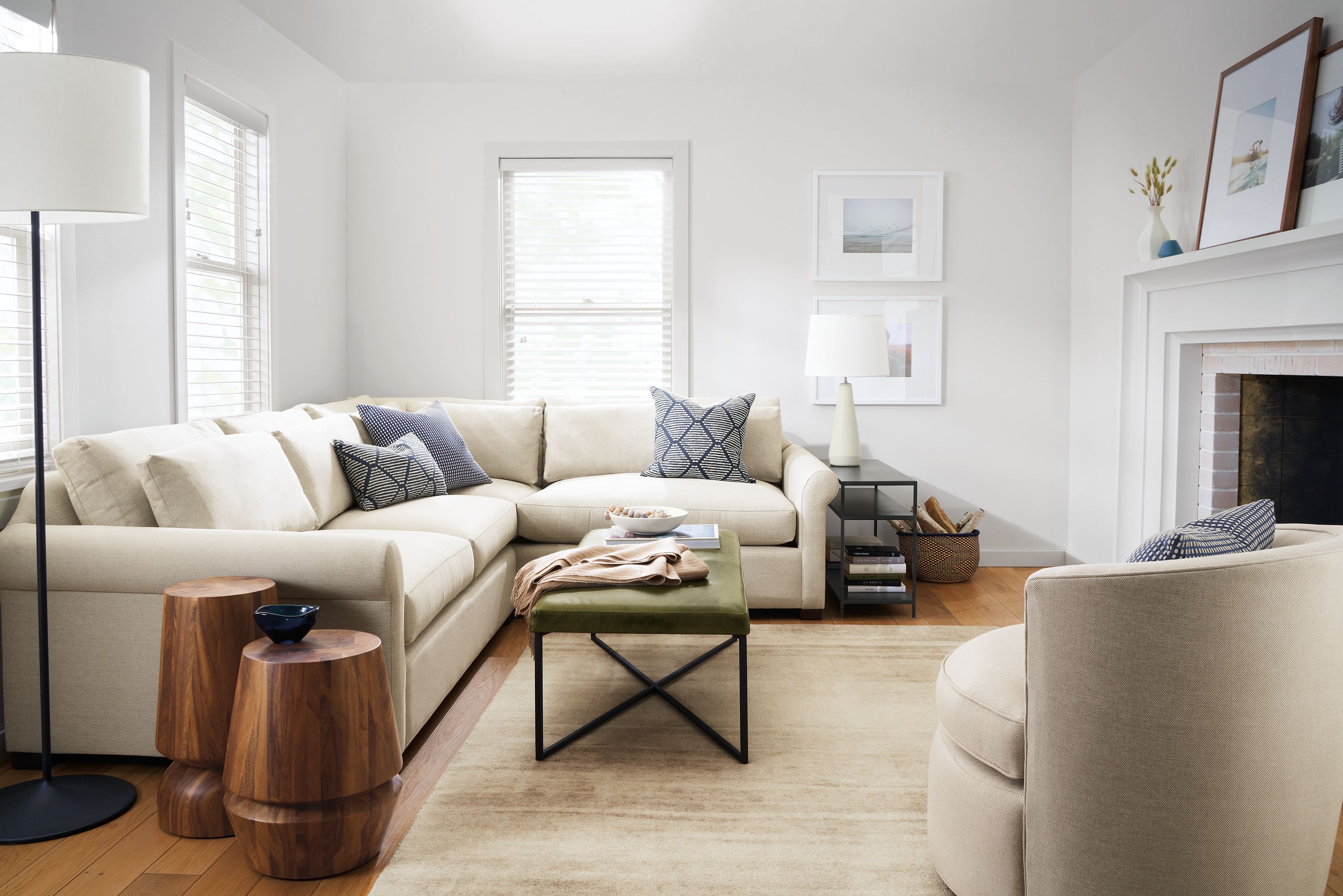 living room with tegan sectional in gino oatmeal with sidney ottoman and otis chair.