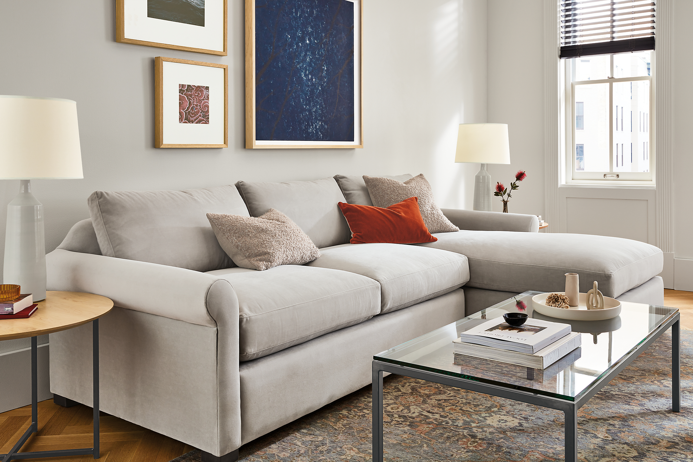 living room including tegan sofa with right-arm chaise, parsons coffee table, vesuvio rug.