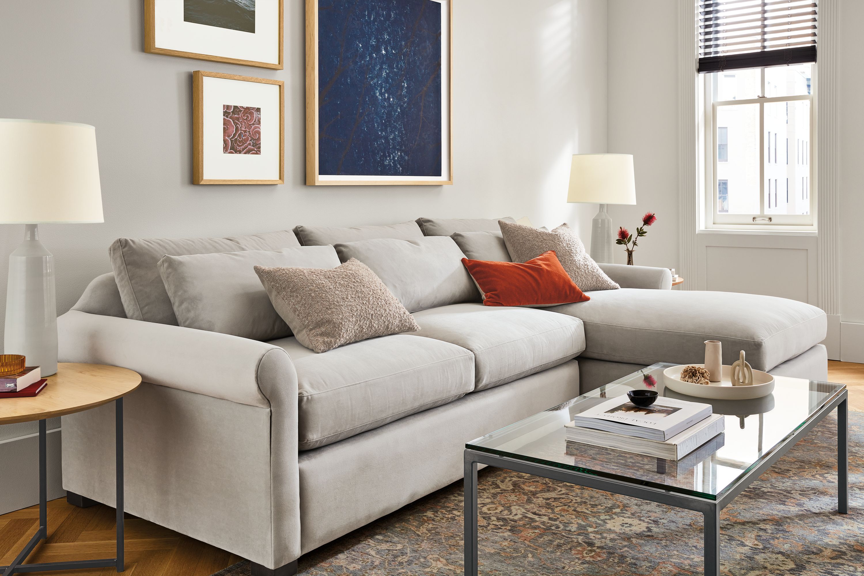 living room including tegan sofa with right-arm chaise, parsons coffee table, vesuvio rug.