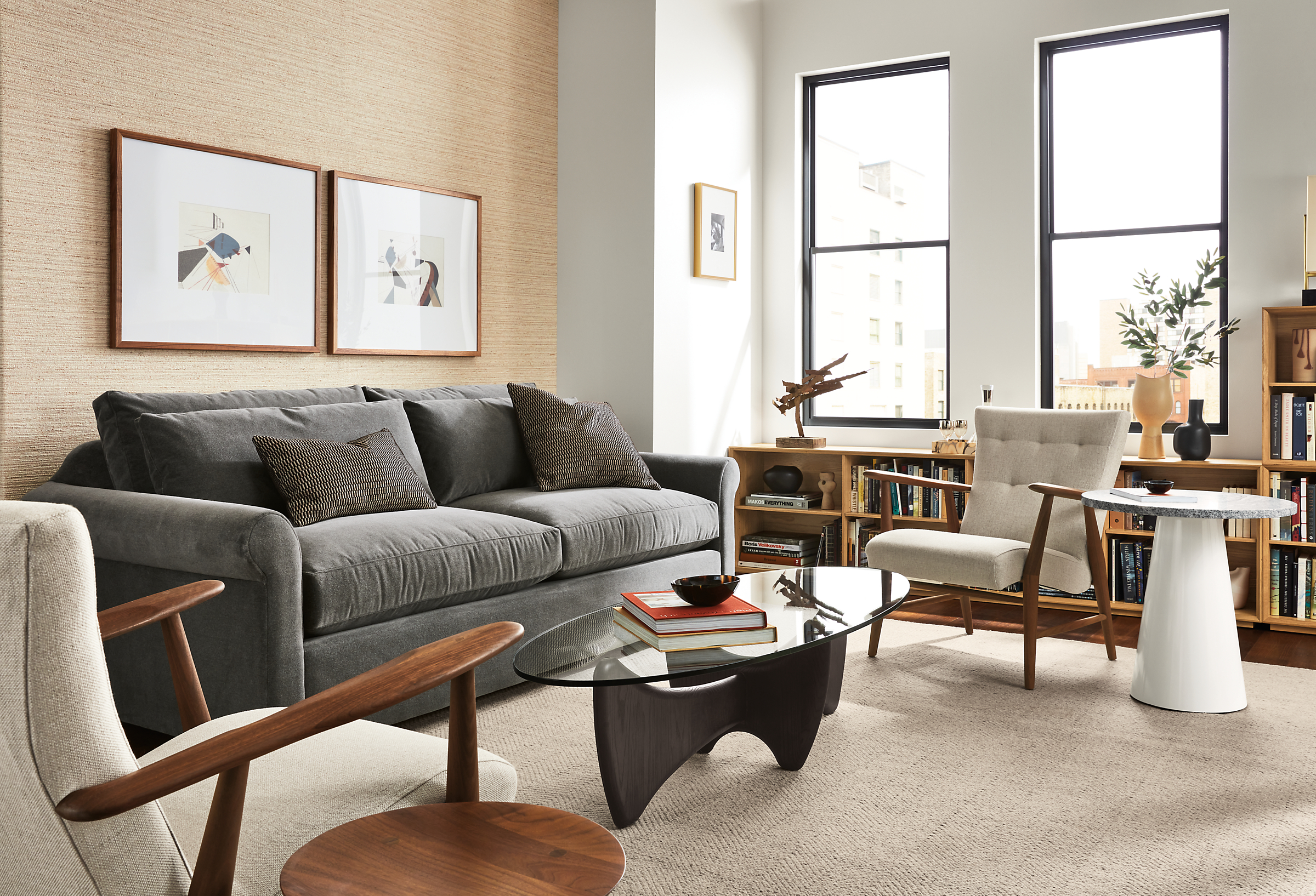 living room with tegan sofa, sanders coffee table, jonas lounge chair, decker end table.