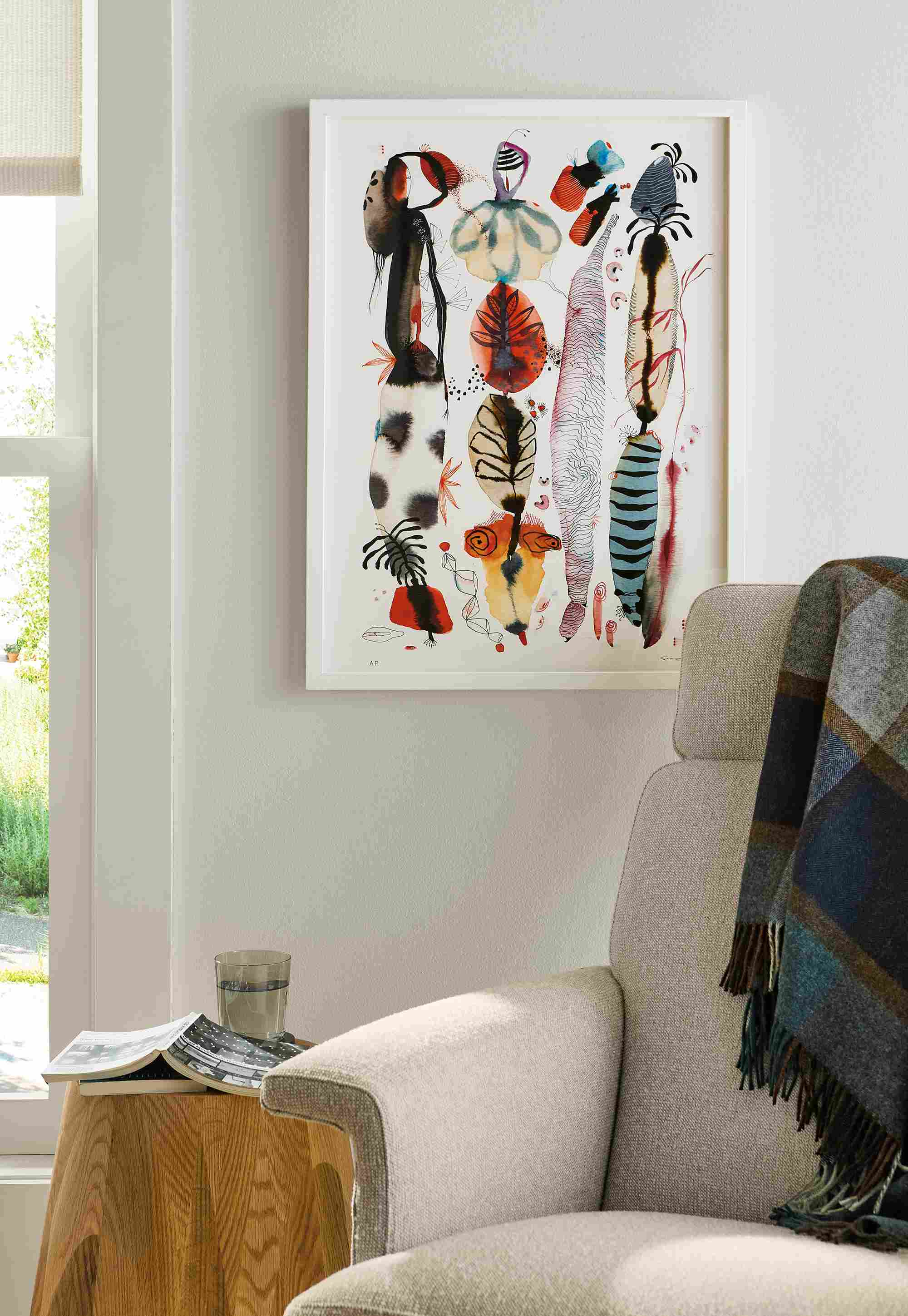 Living room with detail of suyao tian artwork reverie reverberations #2, and daniel swivel chair in conley natural.