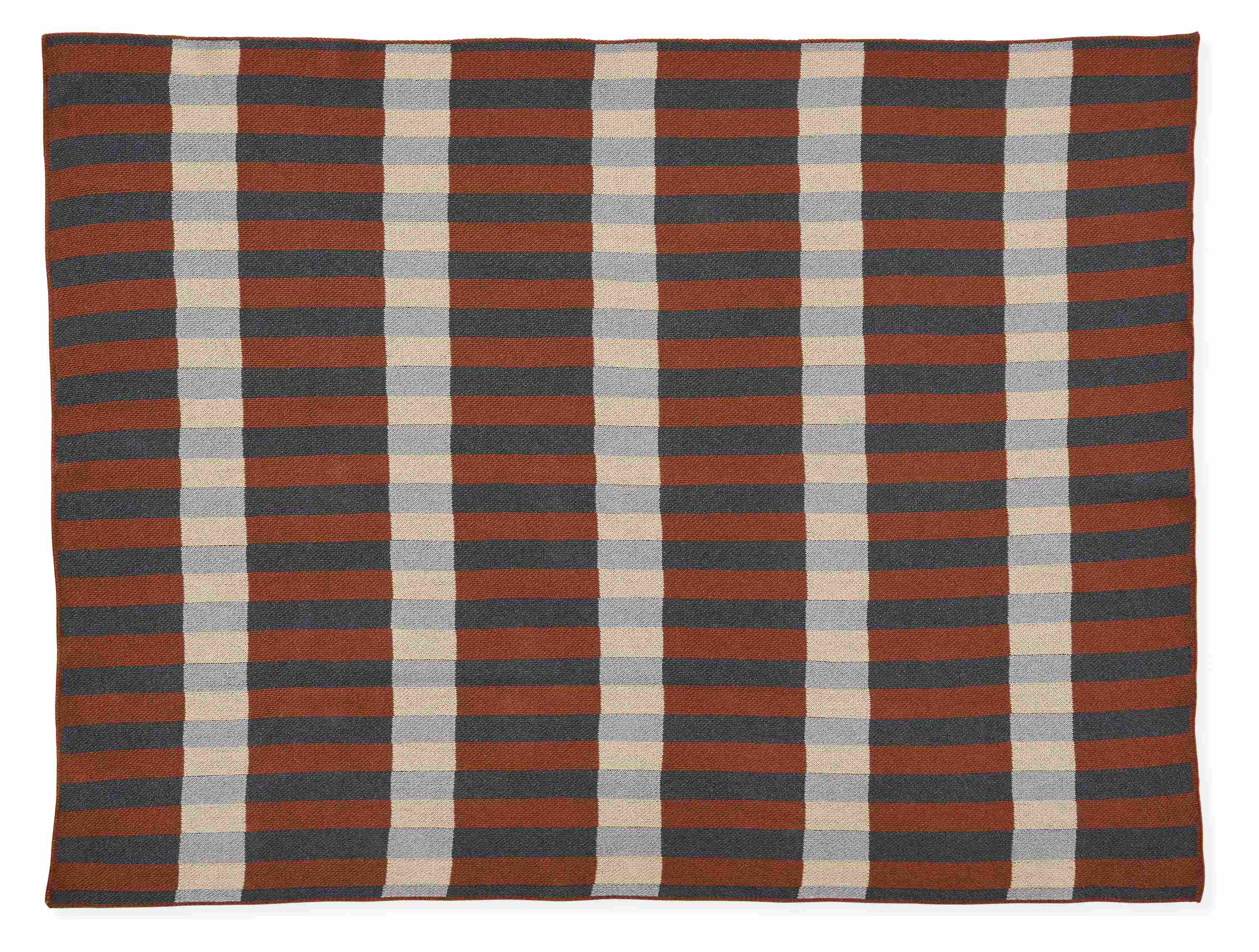 Overhead view of torrey throw blanket in earth.