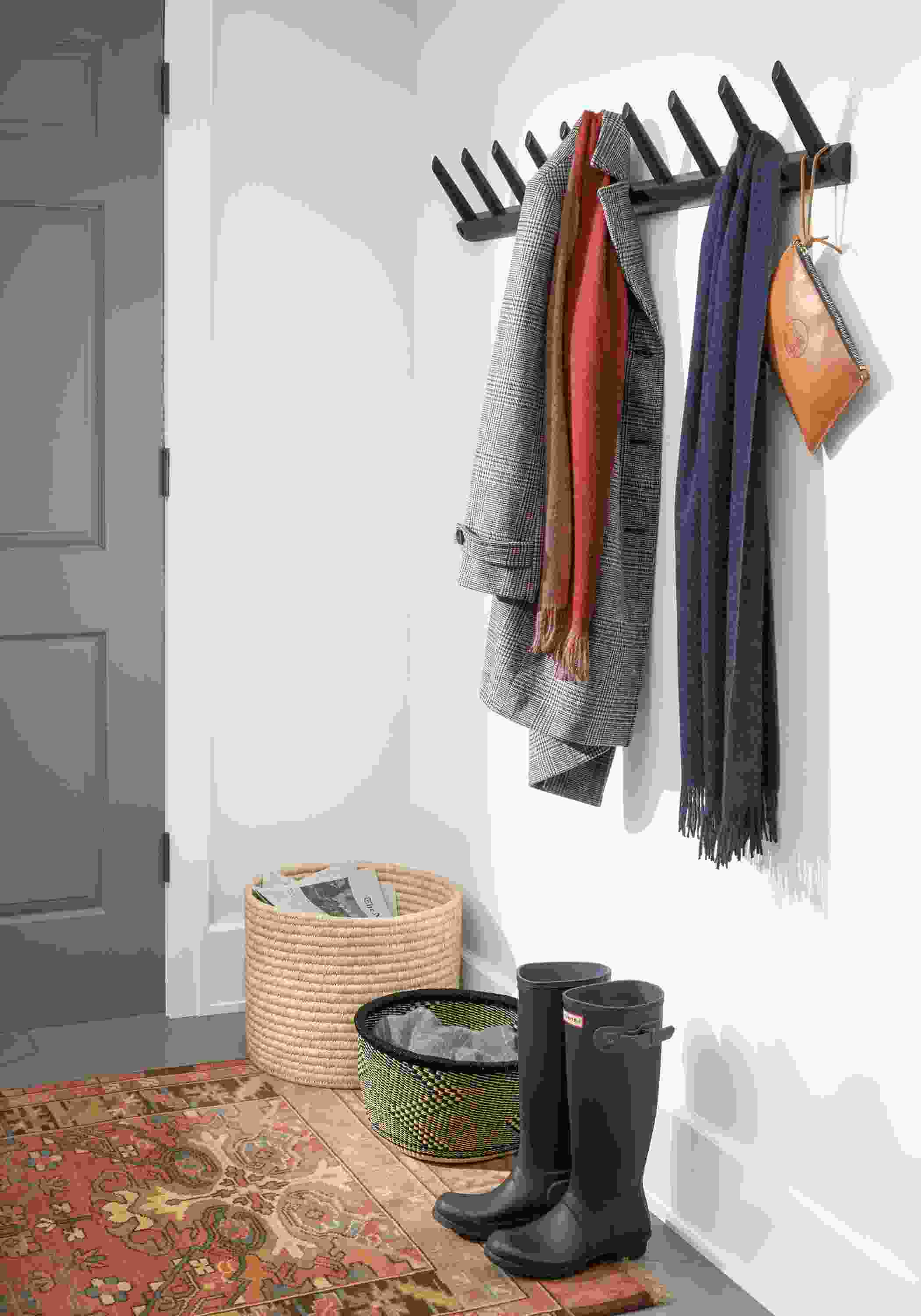 Detail of 2 Torsby scarves hung in entryway.
