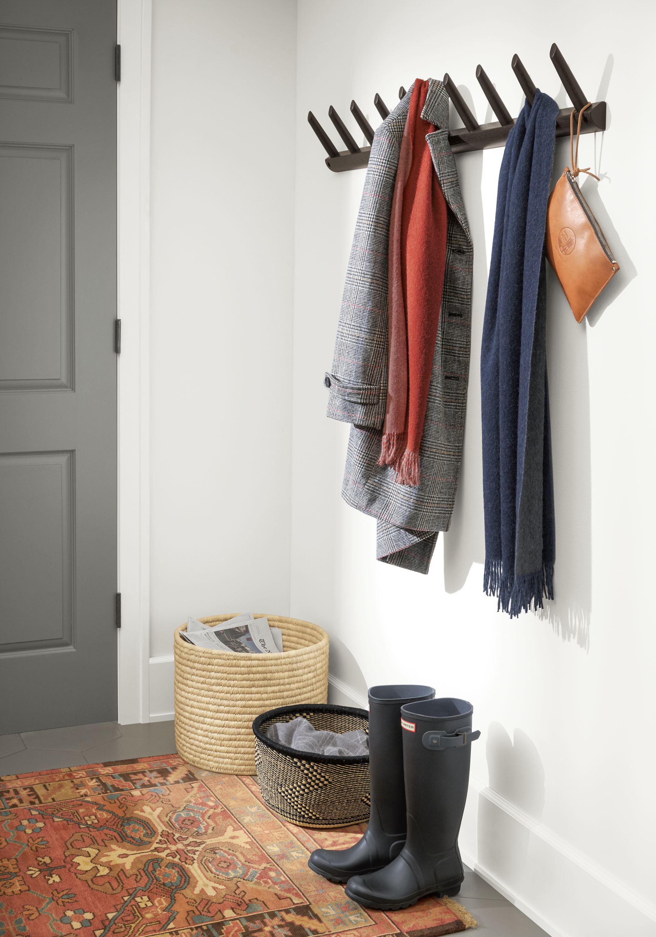 Detail of 2 Torsby scarves hung in entryway.